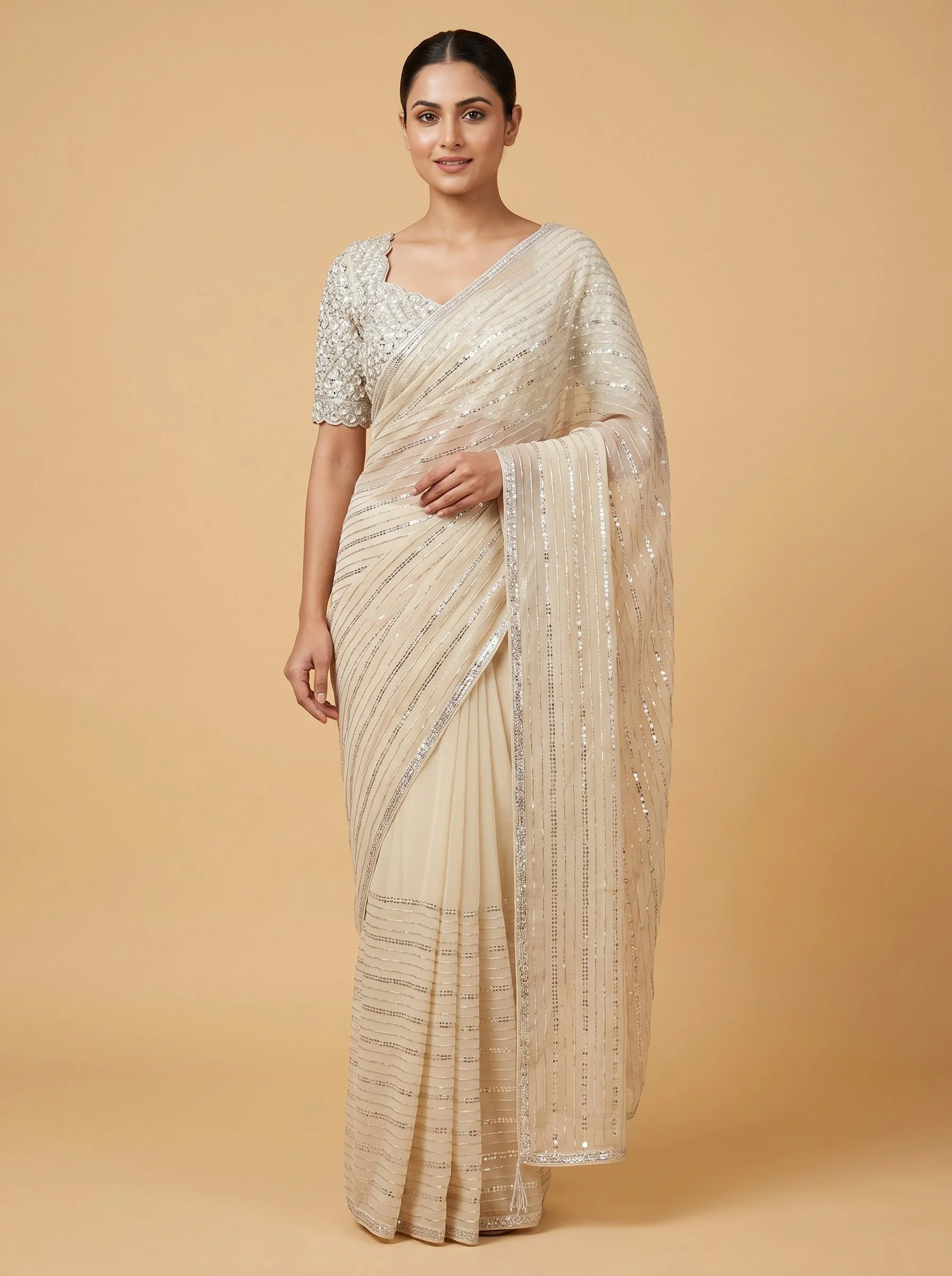Beige embroidered saree with classic design