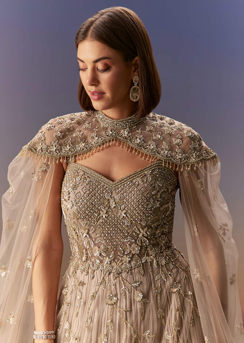 Beige Gown With Shoulder Cape And Rich Vertical Embroidery - Image 3