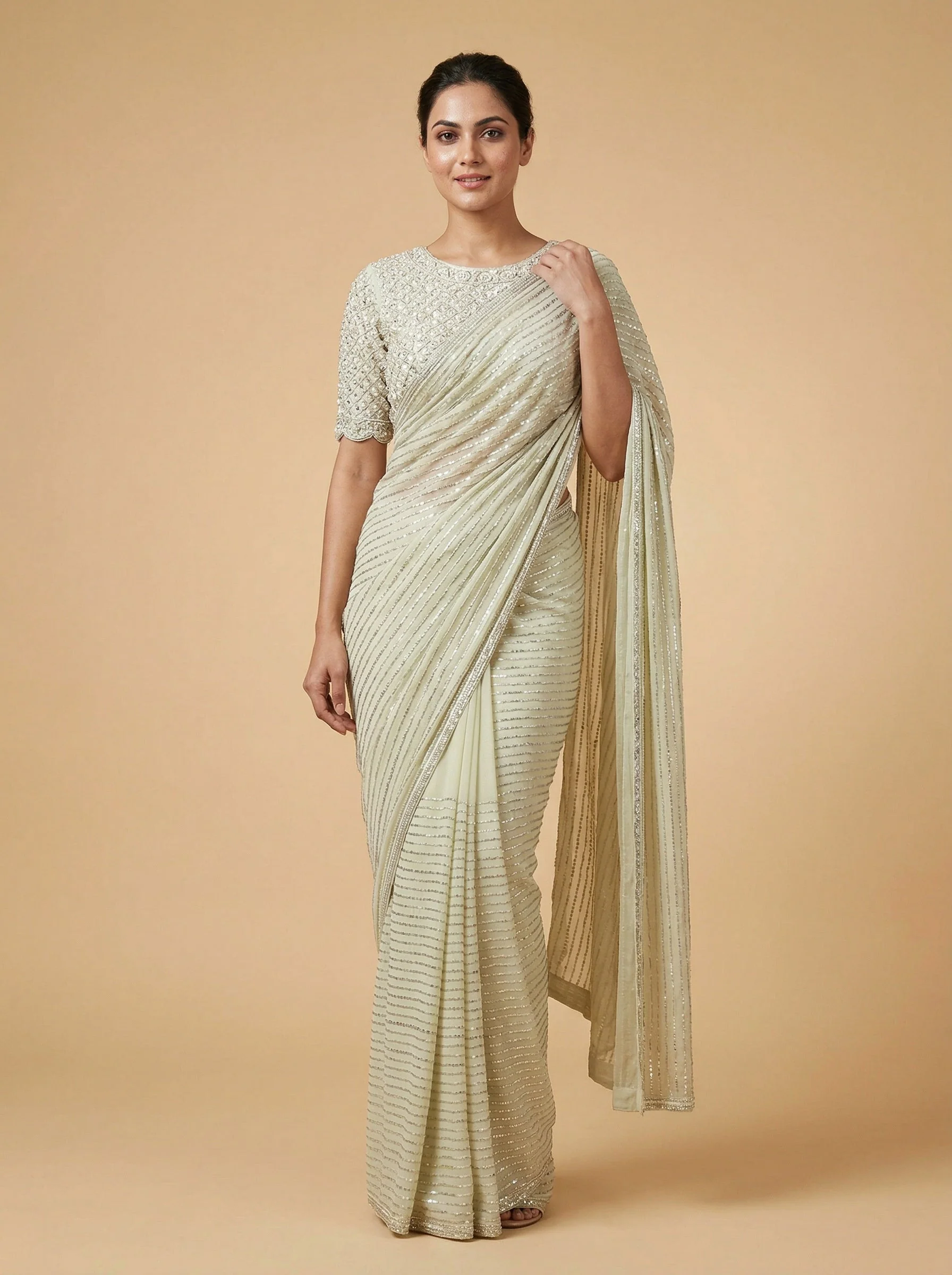 Beige Restrained Embroidered Saree