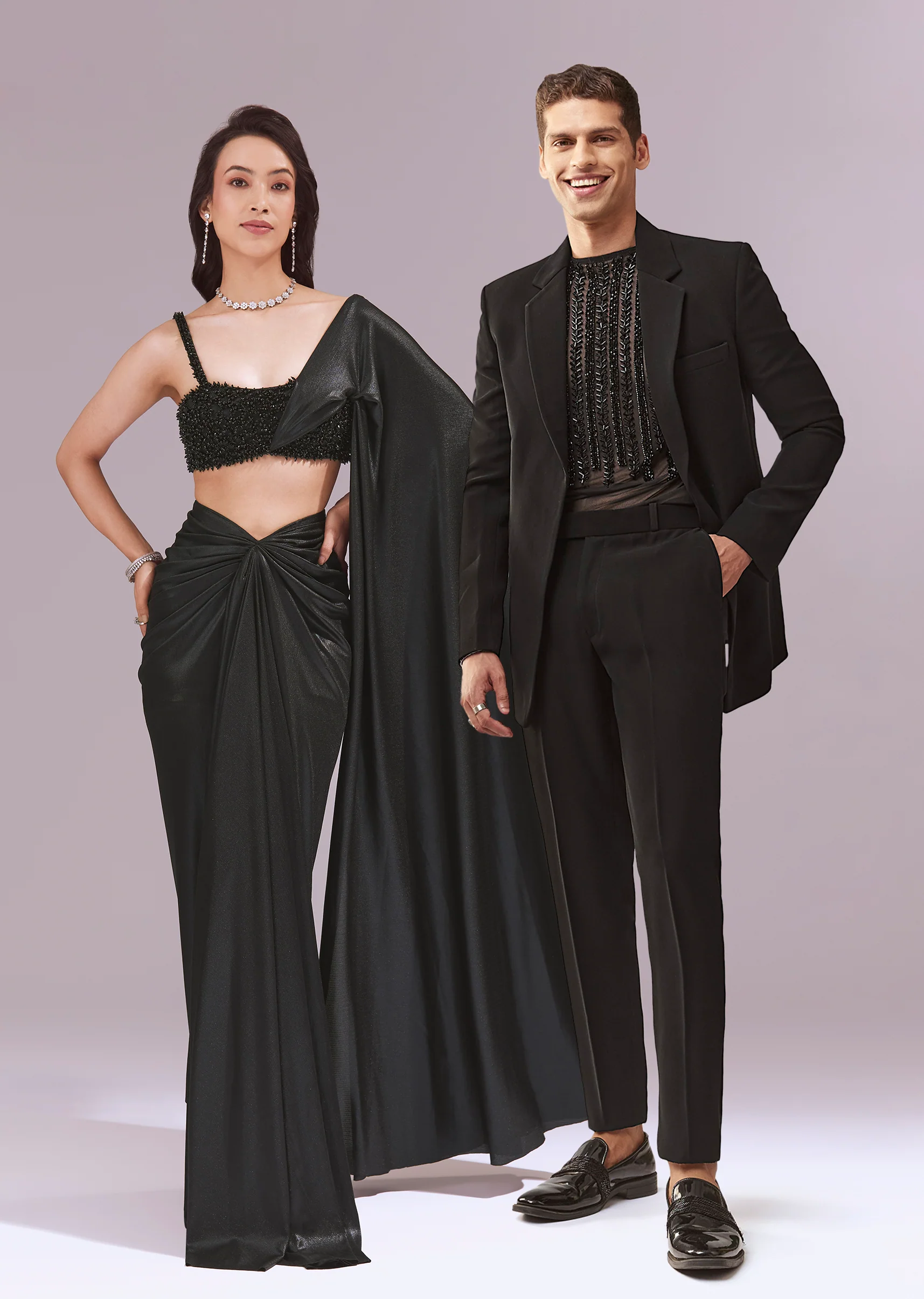 Black Evening Duo – Draped Crop Top Skirt Set For Her And Embellished Indo Western Set For Him