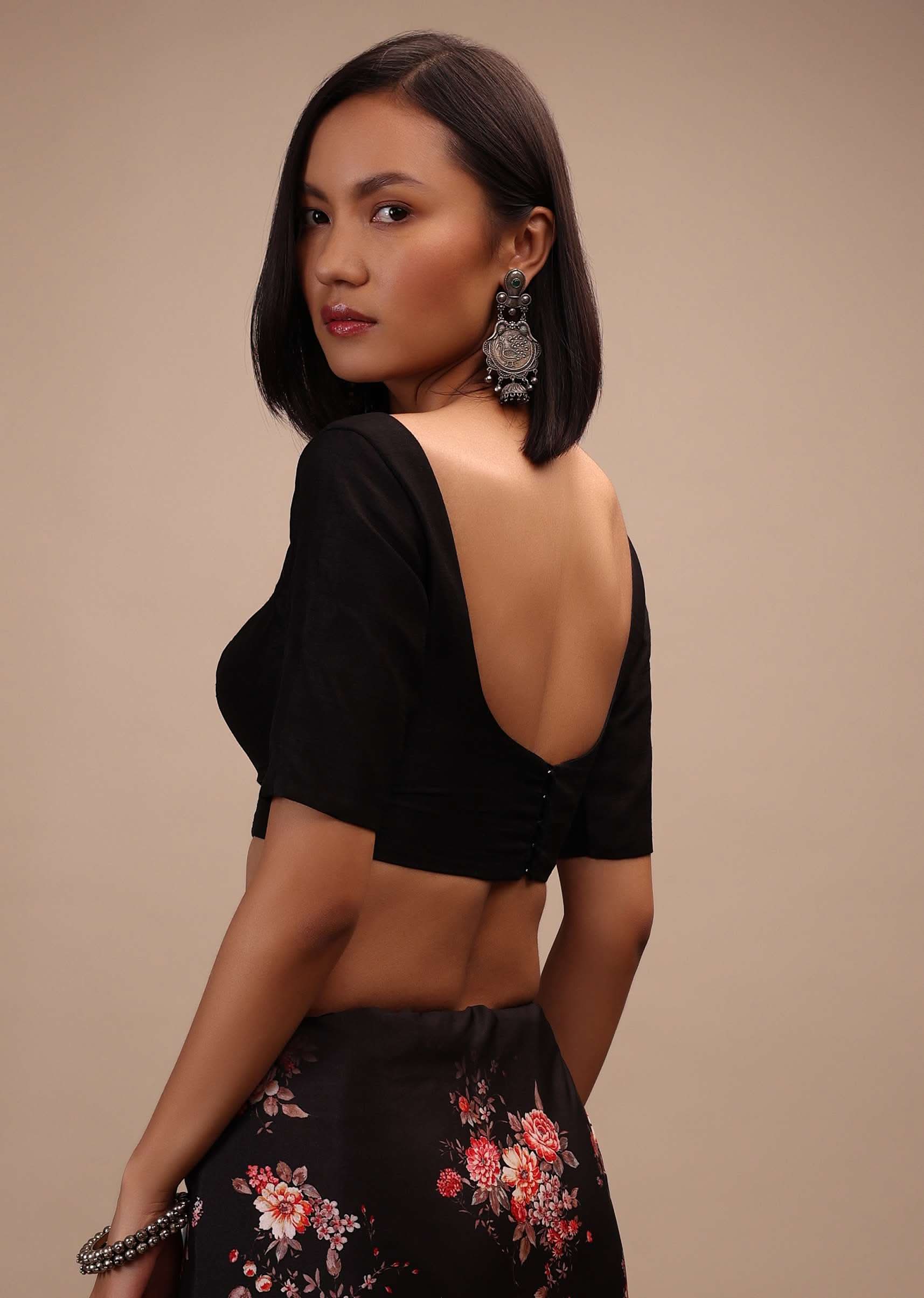 Black Half-Sleeveless Blouse In Scallop Neckline Raw Silk With Back Hook Closure.Padded With A Straight Hemline - Image 2