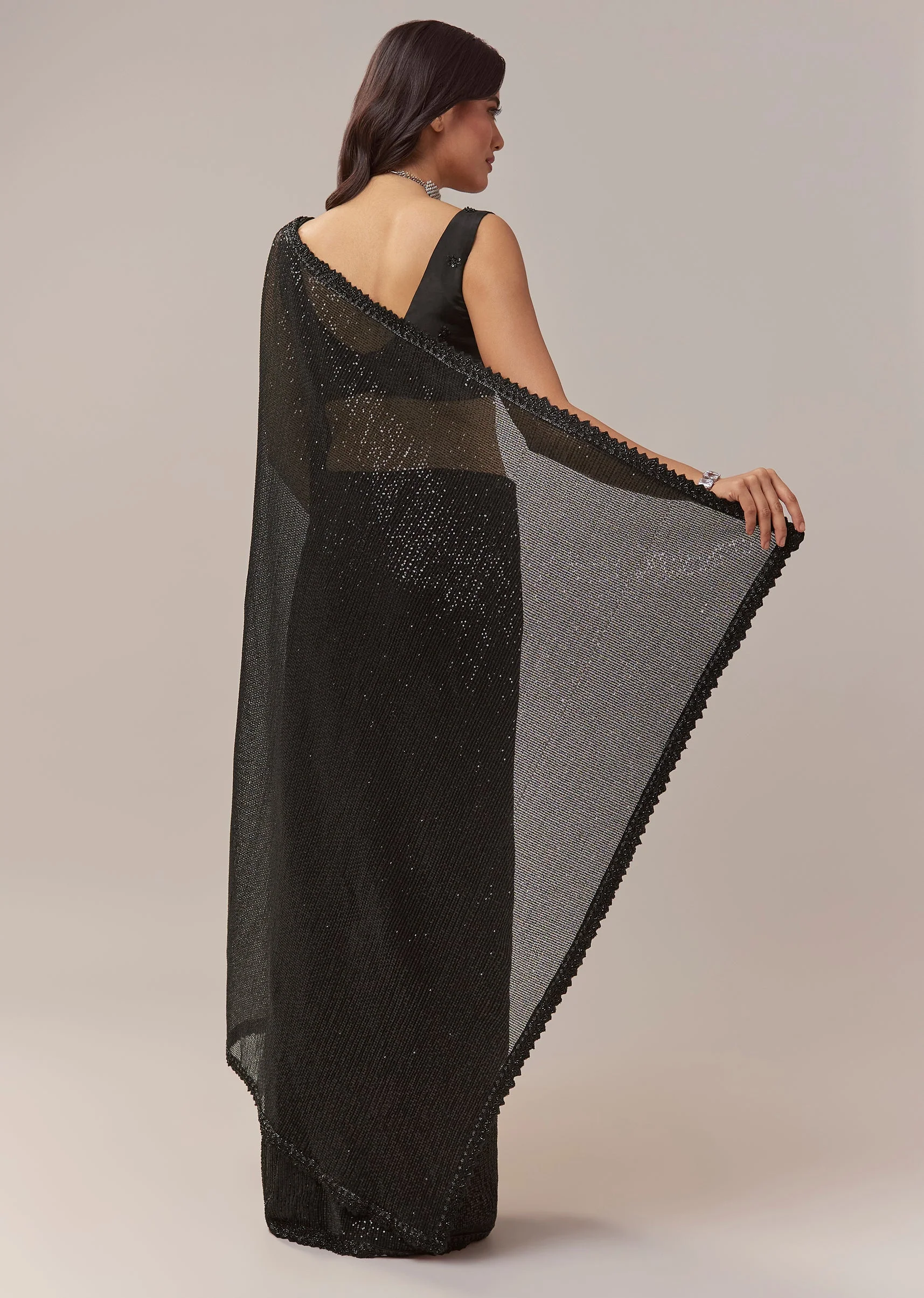 Black Net Saree With Linear Sequins And Hand Embroidered Border - Image 4