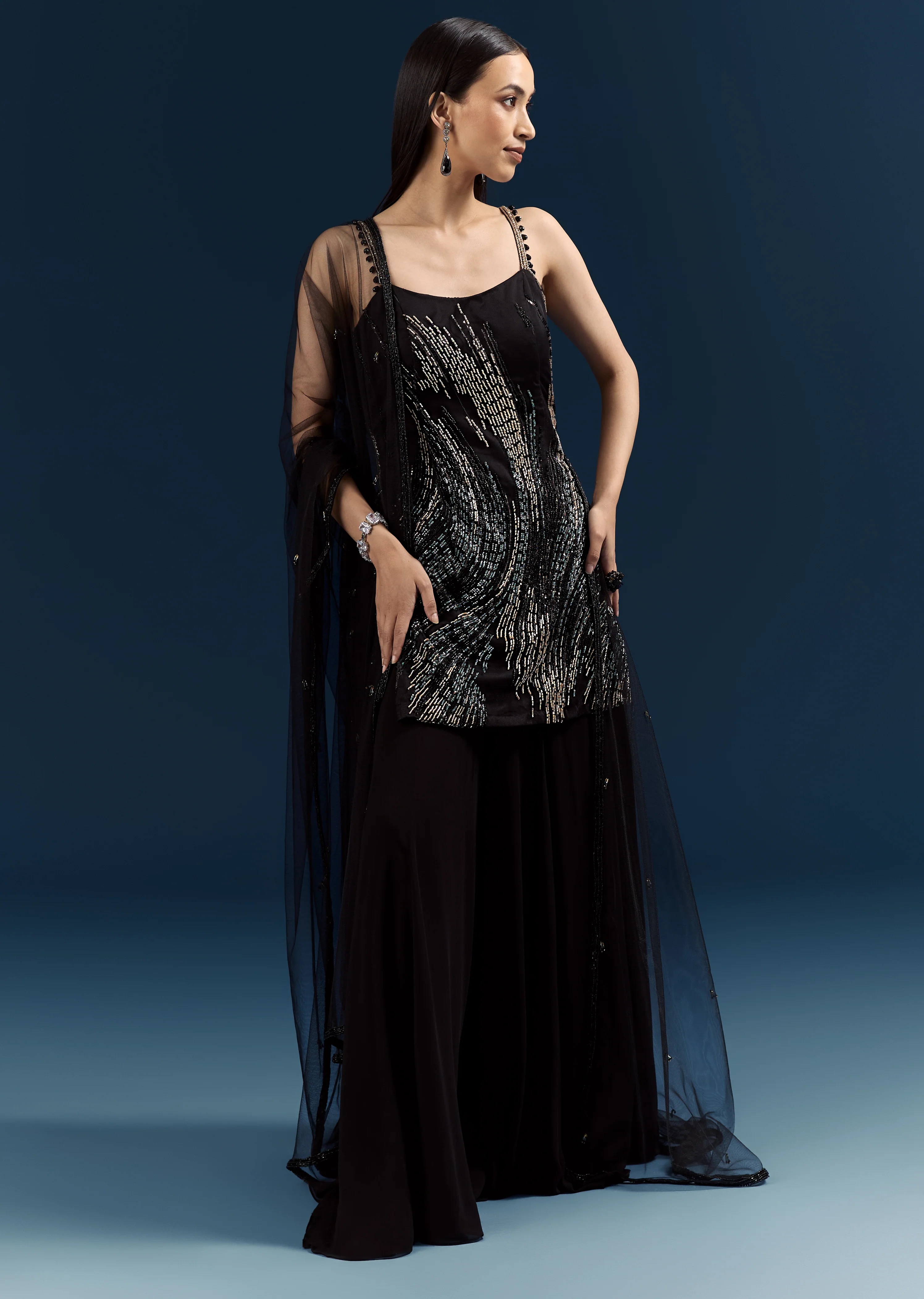 Black Tie Evening Glamour Couple Set – Black Sequins Sharara Suit with Cutdana Embroidery for Her And Black Jacquard Indo-Western Set with Embroidered Stole for Him - Image 3
