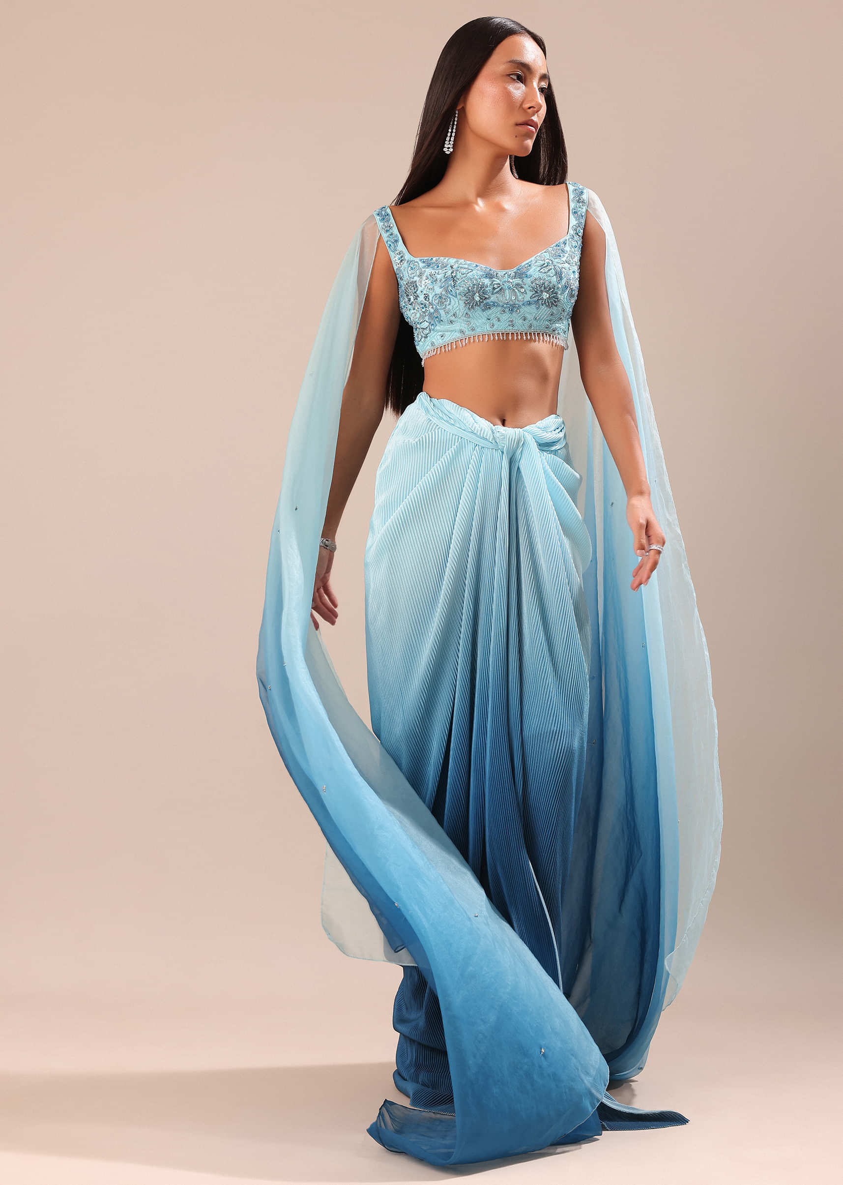 Blue Pre Pleated Twisted Skirt And Blouse With Attched Cape - Image 3