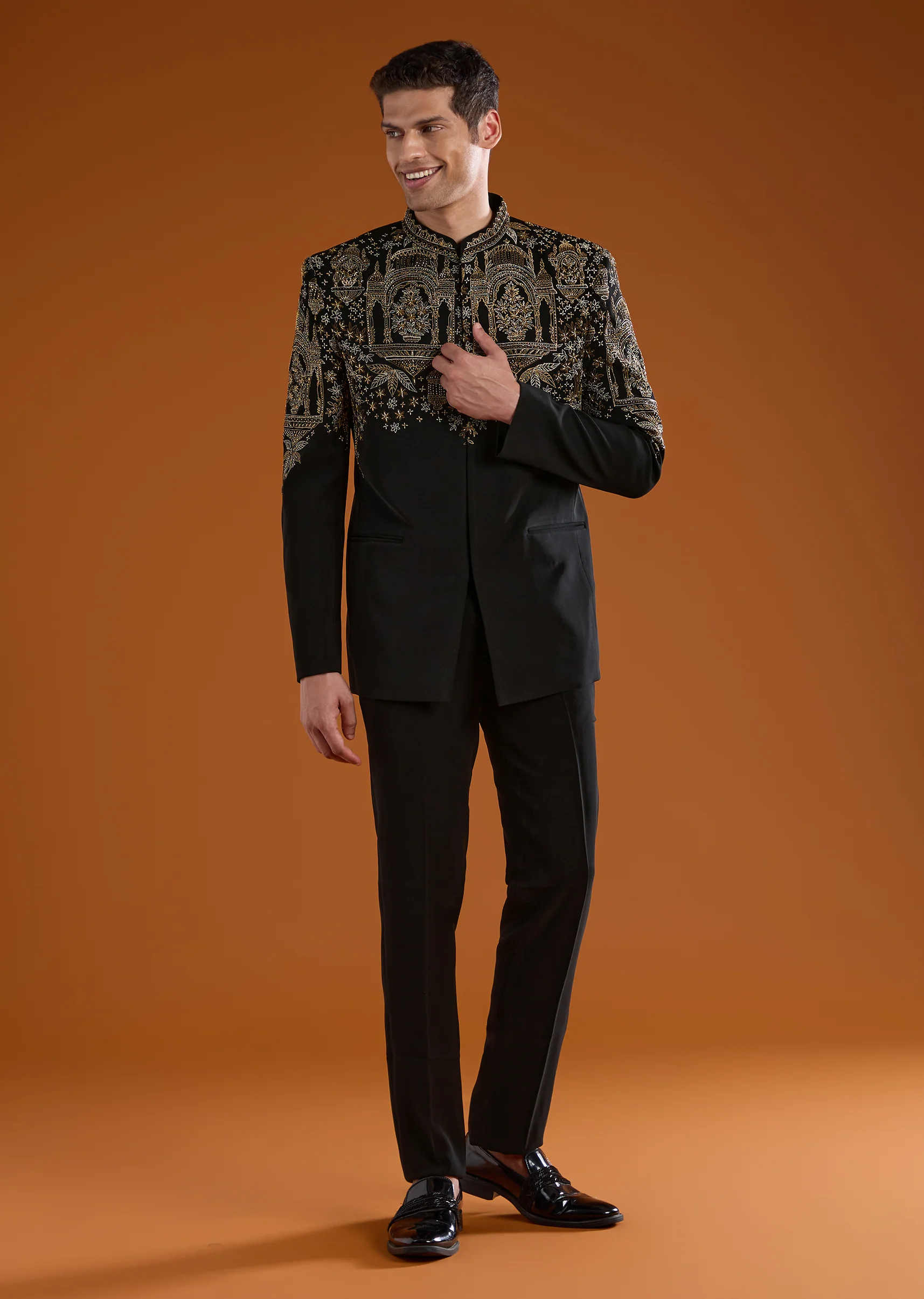 Bold Festive Couple Set – Black Silk Palazzo Suit With Zari Thread And Sequins Work For Her And Black Suiting Jodhpuri Pant Set With Embroidery For Him - Image 7