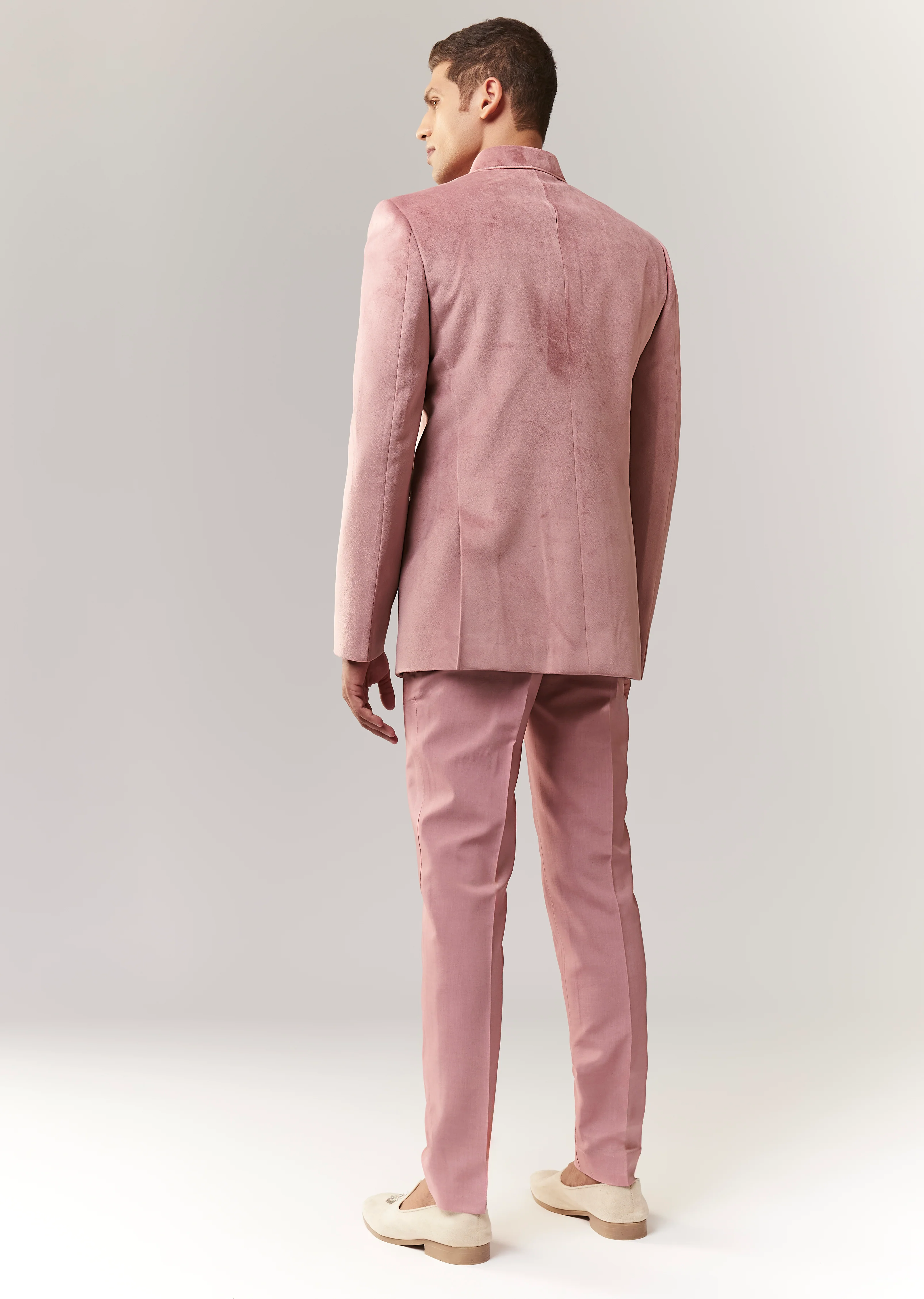 Celebration Couple Set – Blush Pink Georgette Fish-Cut Lehenga with Embroidered Sleeveless Blouse & Choker Dupatta for Her And Pink Jodhpuri-Style Tuxedo Set with Metal Broach for Him - Image 9