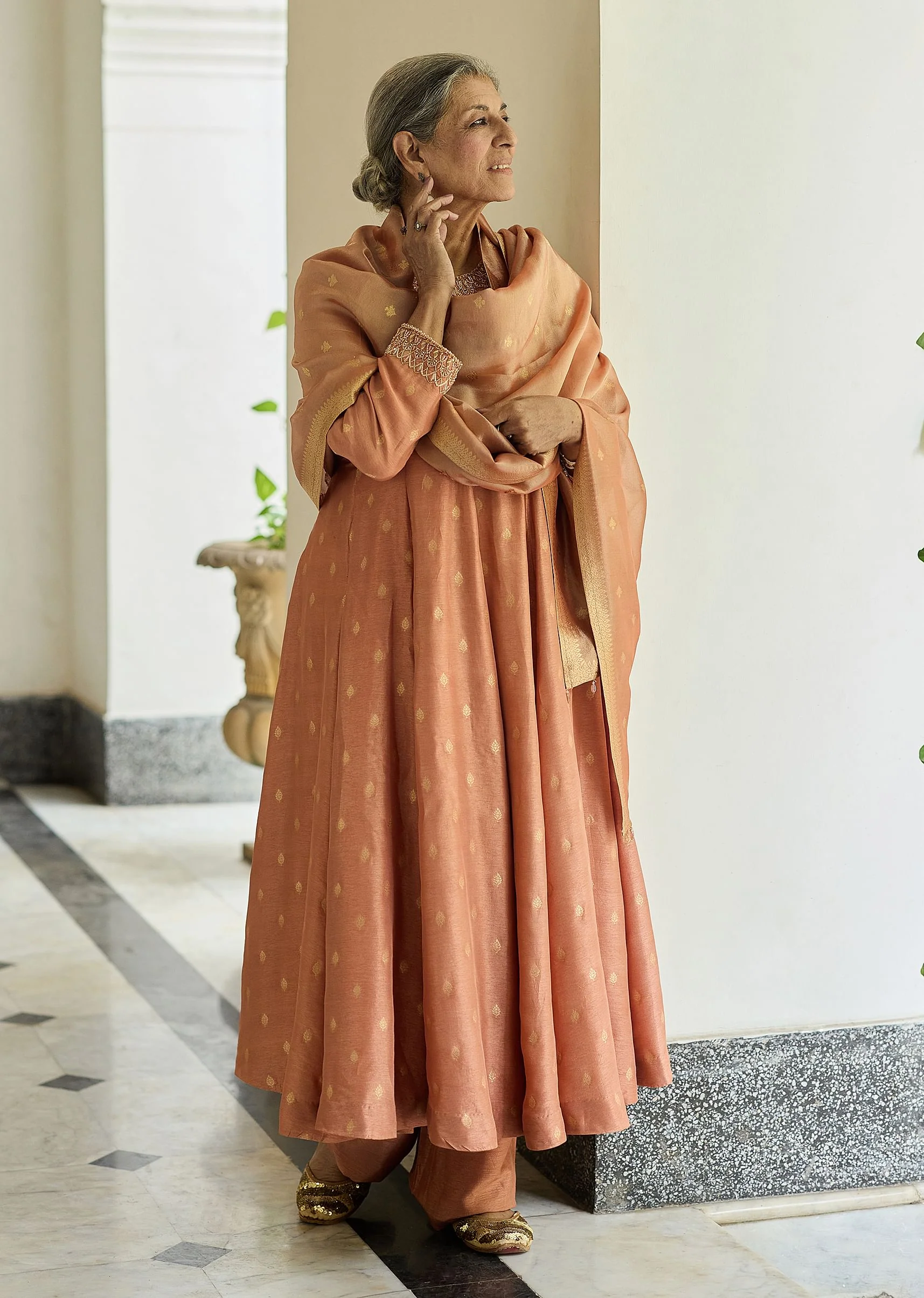 Dusty peach embroidered anarkali paired with pant and dupatta.
