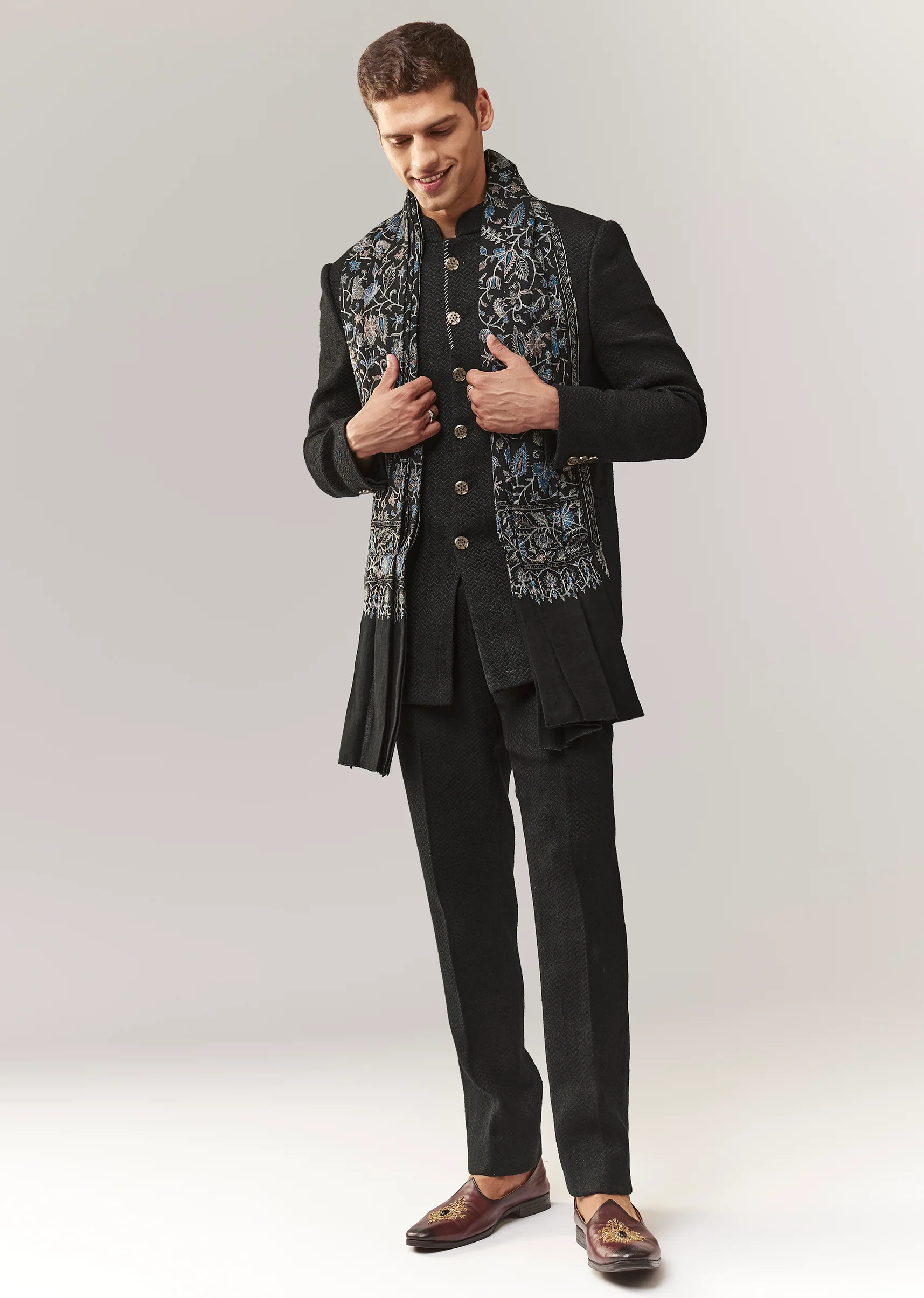 Elegant Festive Couple Set – Black Printed Mirror Work Lehenga Choli In Organza Tissue For Her And Black Matka Silk Jodhpuri Set With Mandarin Collar For Him - Image 7