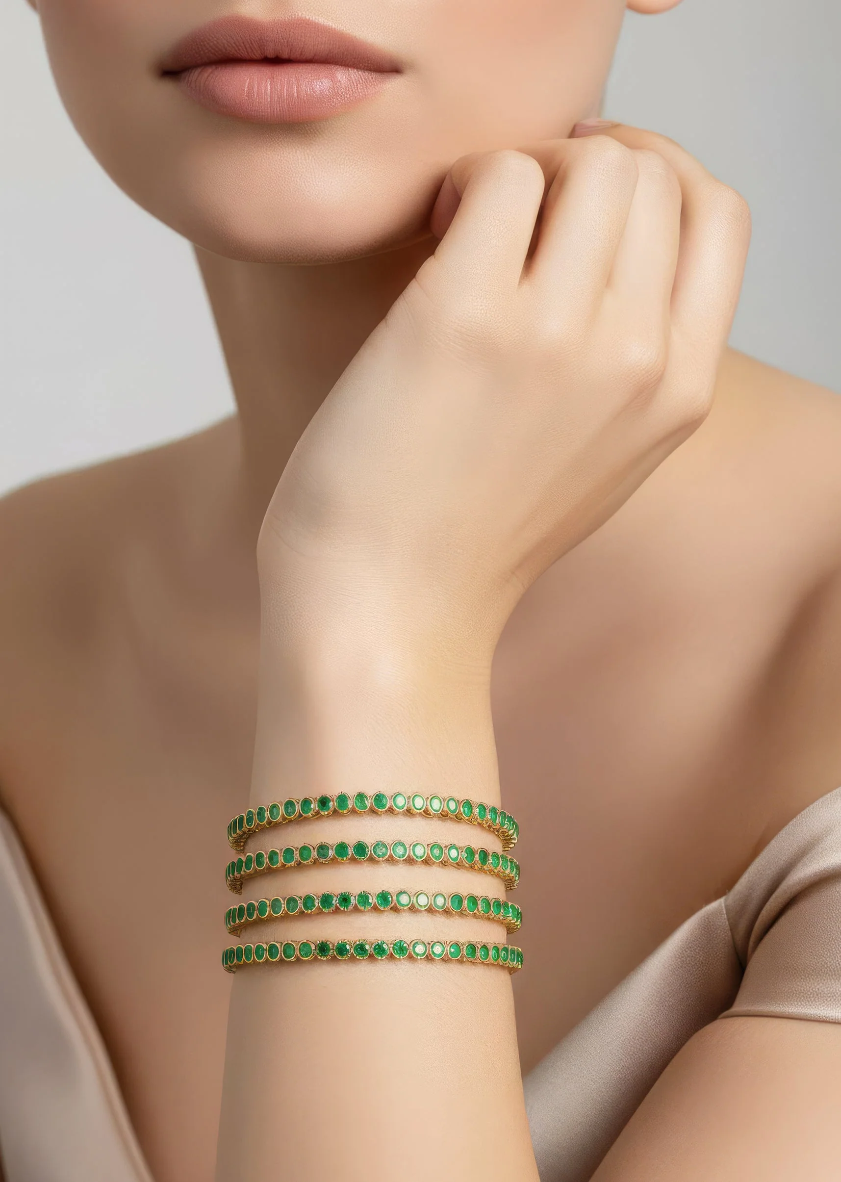 Gold Finish Bangle With Traditional Temple Motifs And Green Simulated Stones