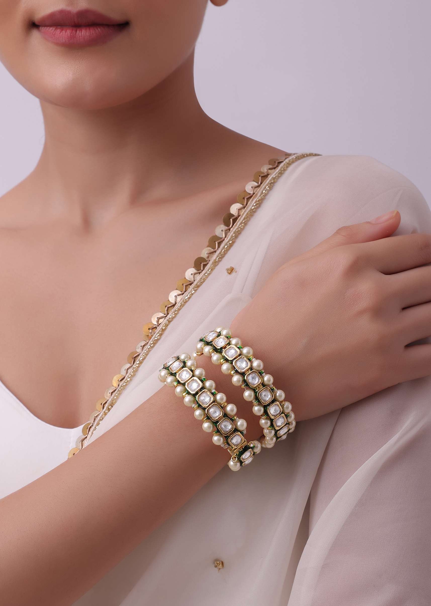 Gold Finish Kundan Bangles With Green Meenakari - Image 5