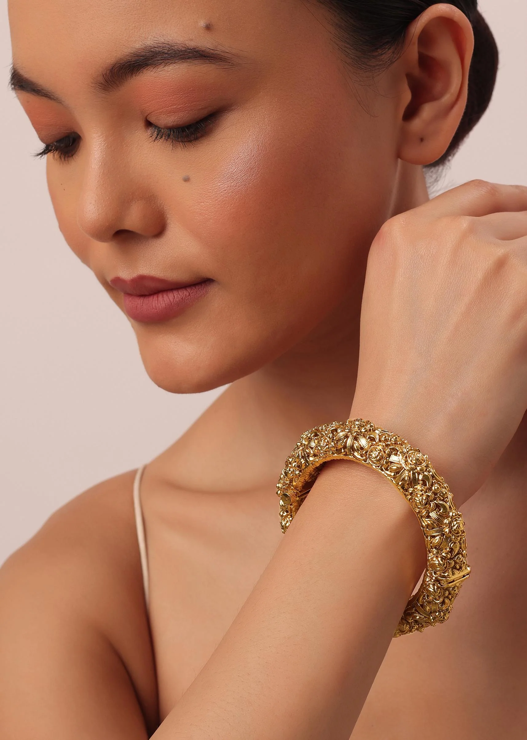 Gold Finish Temple Style Carved Bangle In Mix Metal