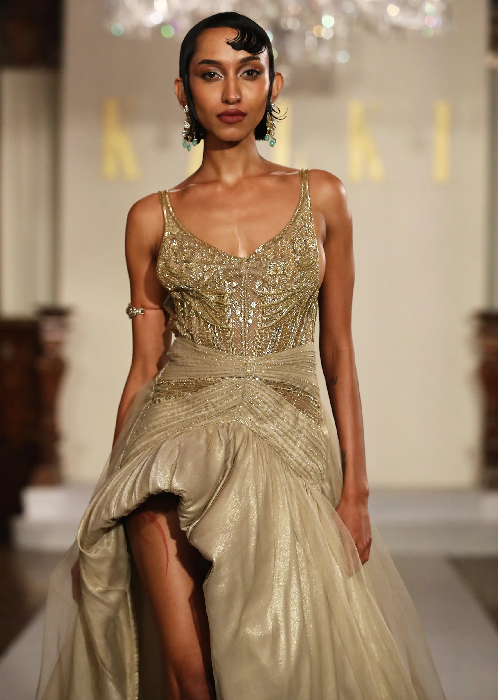 Gold Metallic Hand Embroidered Bridal Gown With Asymmetric Fall - Image 2