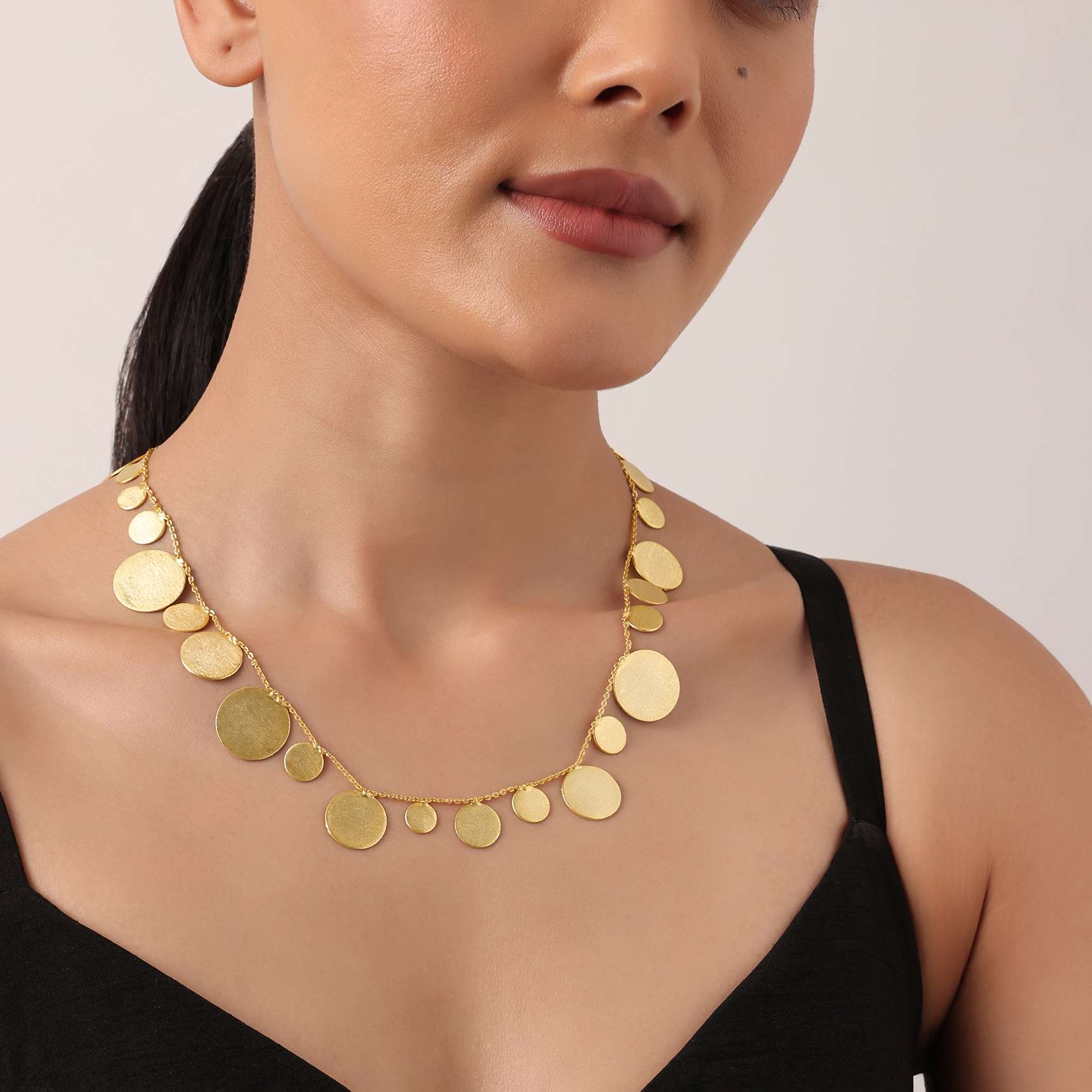 Gold Short Necklace With Coin Shaped Cutouts - Image 2