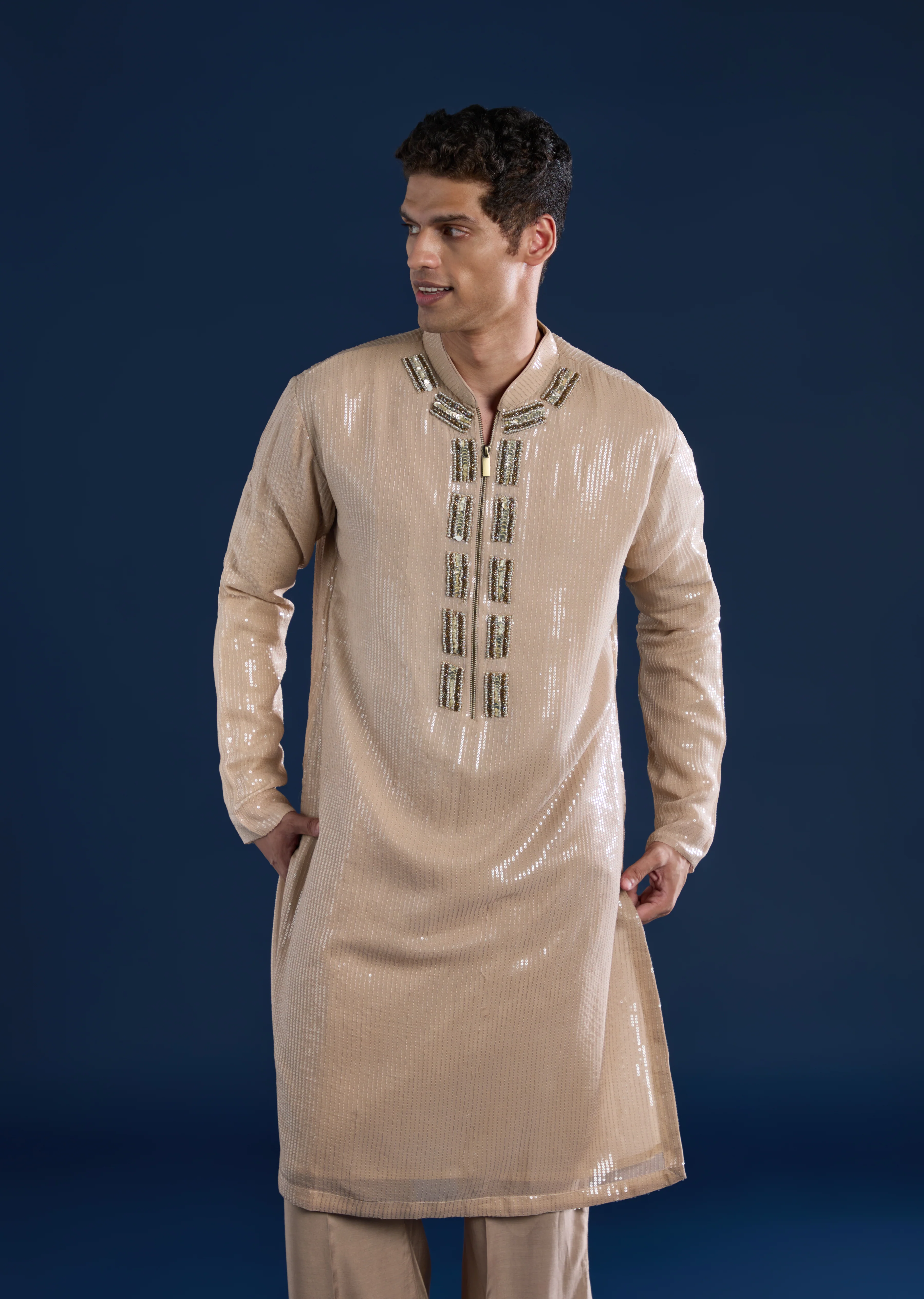 Grand Celebration Couple Set – Gold Ready-Pleated Satin Saree with Stone Detailing for Her And Beige Embroidered Kurta Jacket Set for Him - Image 8