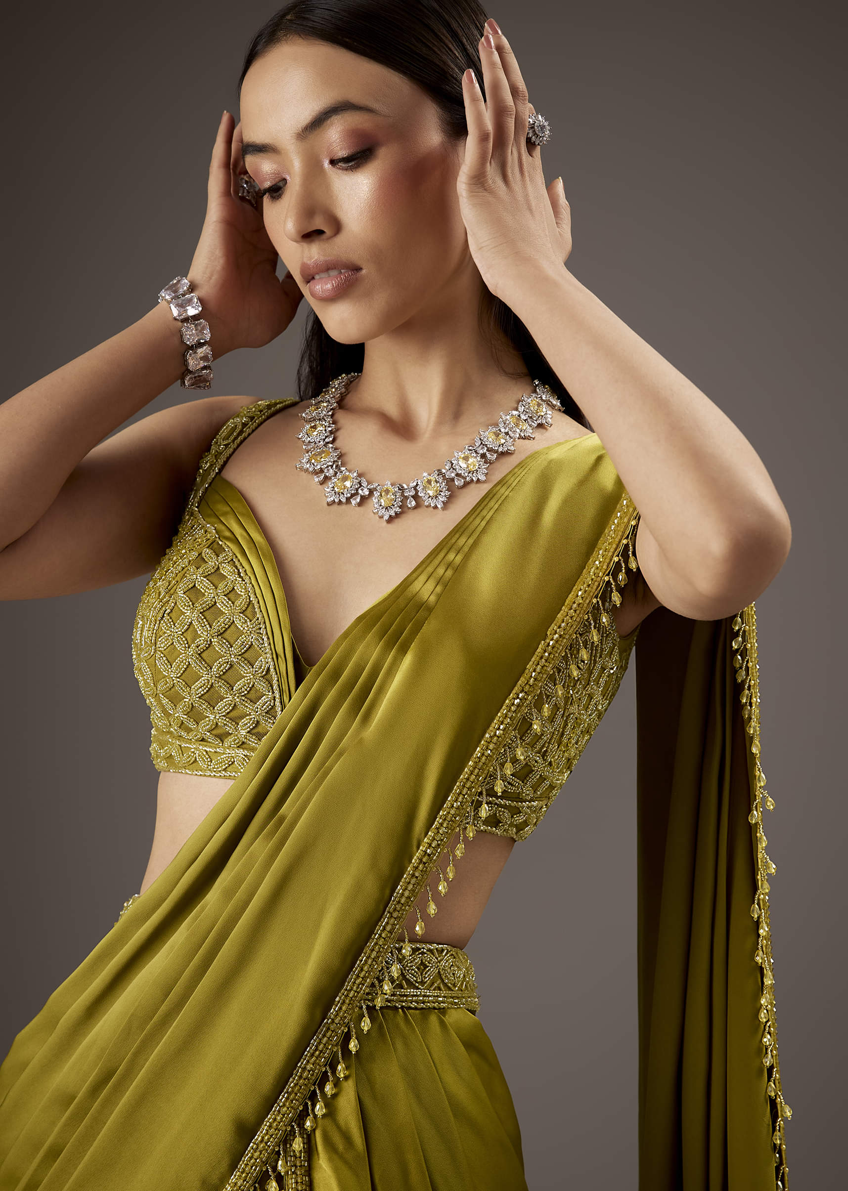 Green Silk Saree With Elegant Bead Work And Frills - Image 3