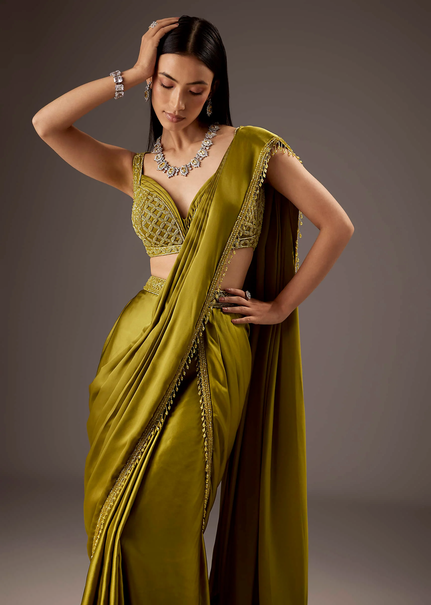Green Silk Saree With Elegant Bead Work And Frills - Image 5