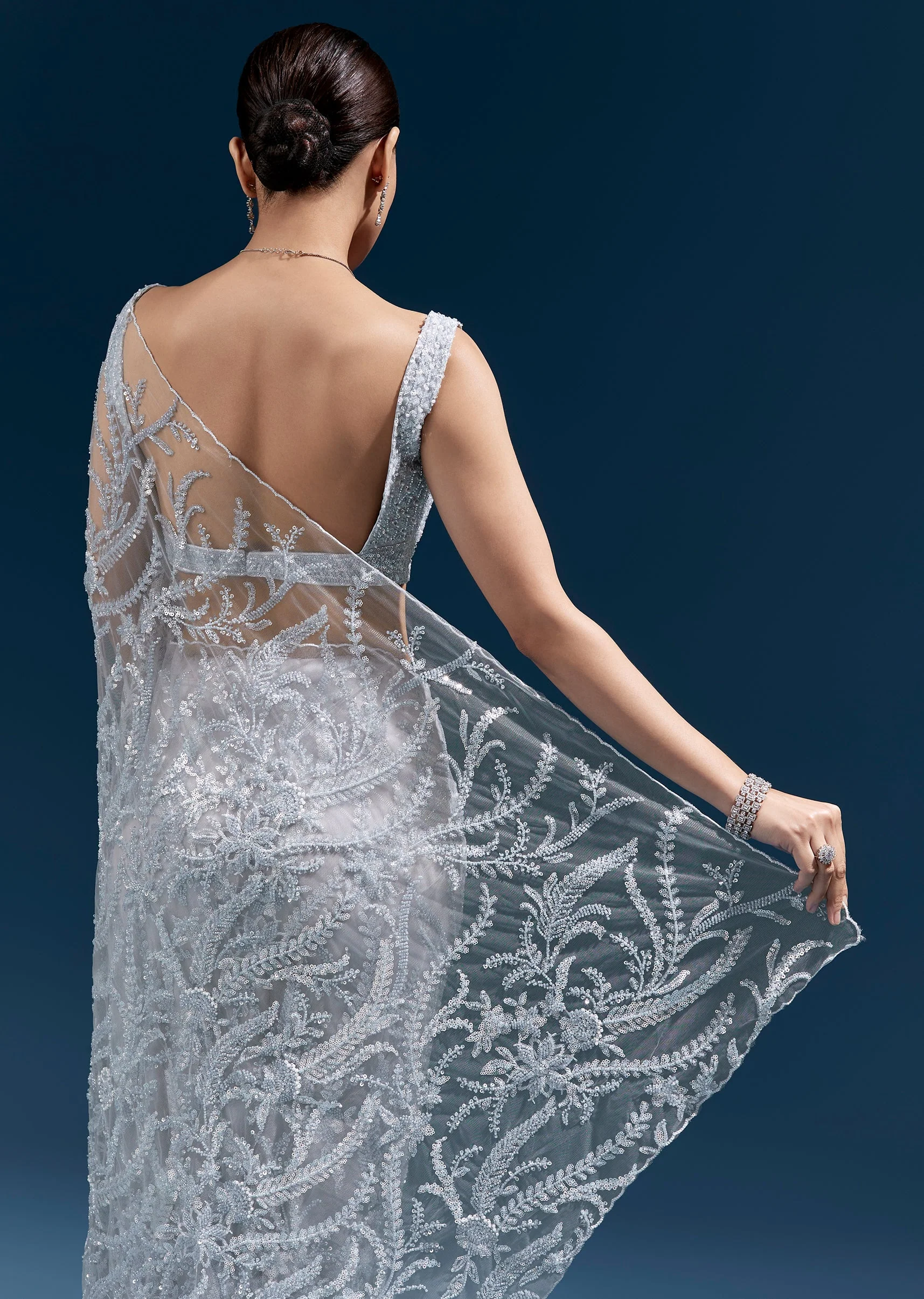 Ice Blue Heavy Embroidered Net Saree With Cutwork Border And All Over Floral Jaal - Image 6