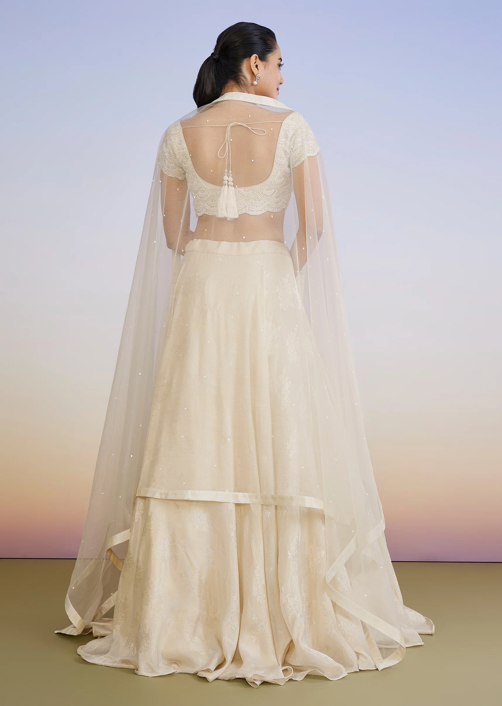 Ivory Regal Duo – Embroidered Lehenga For Her And Jacquard Jodhpuri Suit For Him - Image 5