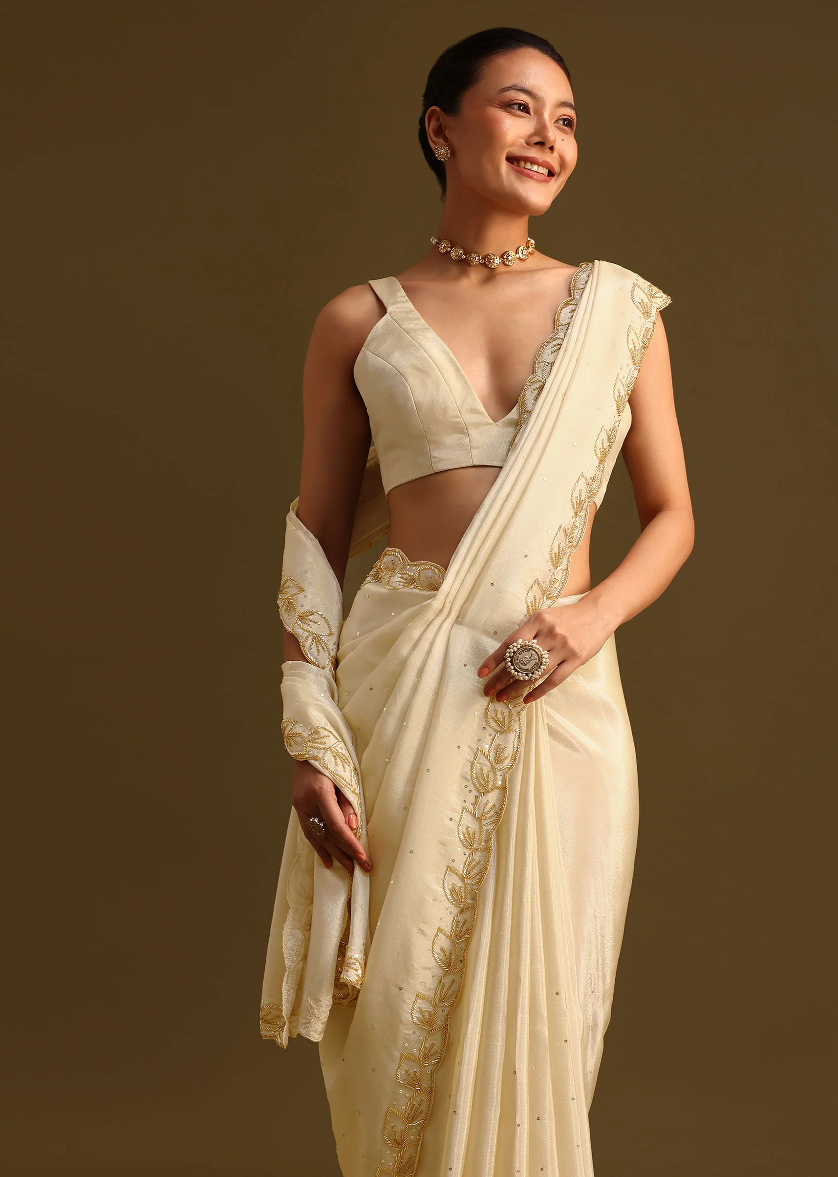 Ivory Tissue Saree With Cutdana Embroidered Border and Unstitched Blouse - Image 5