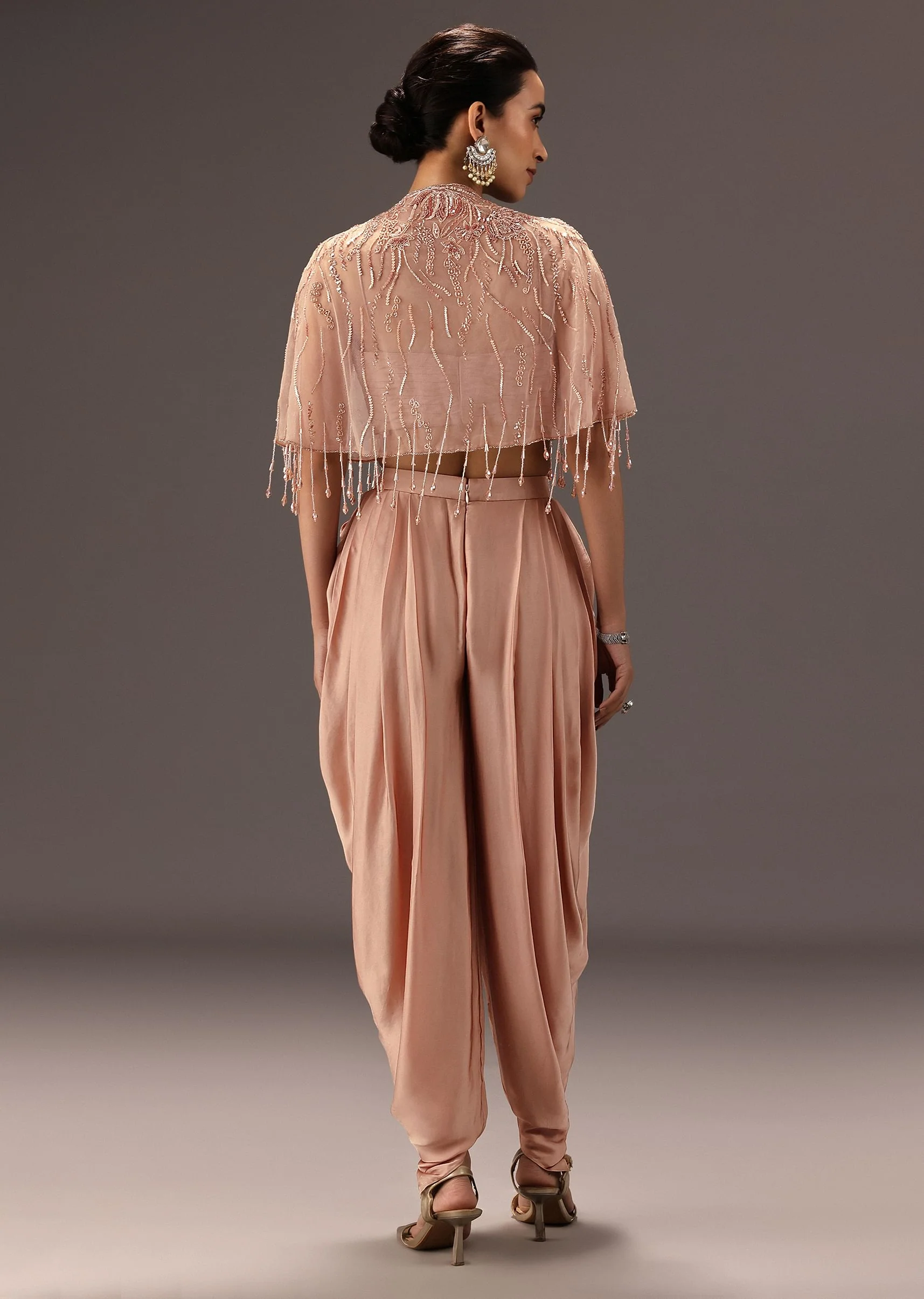 Nude Pleated Blouse With Tassel Cape And Dhoti Pants - Image 6