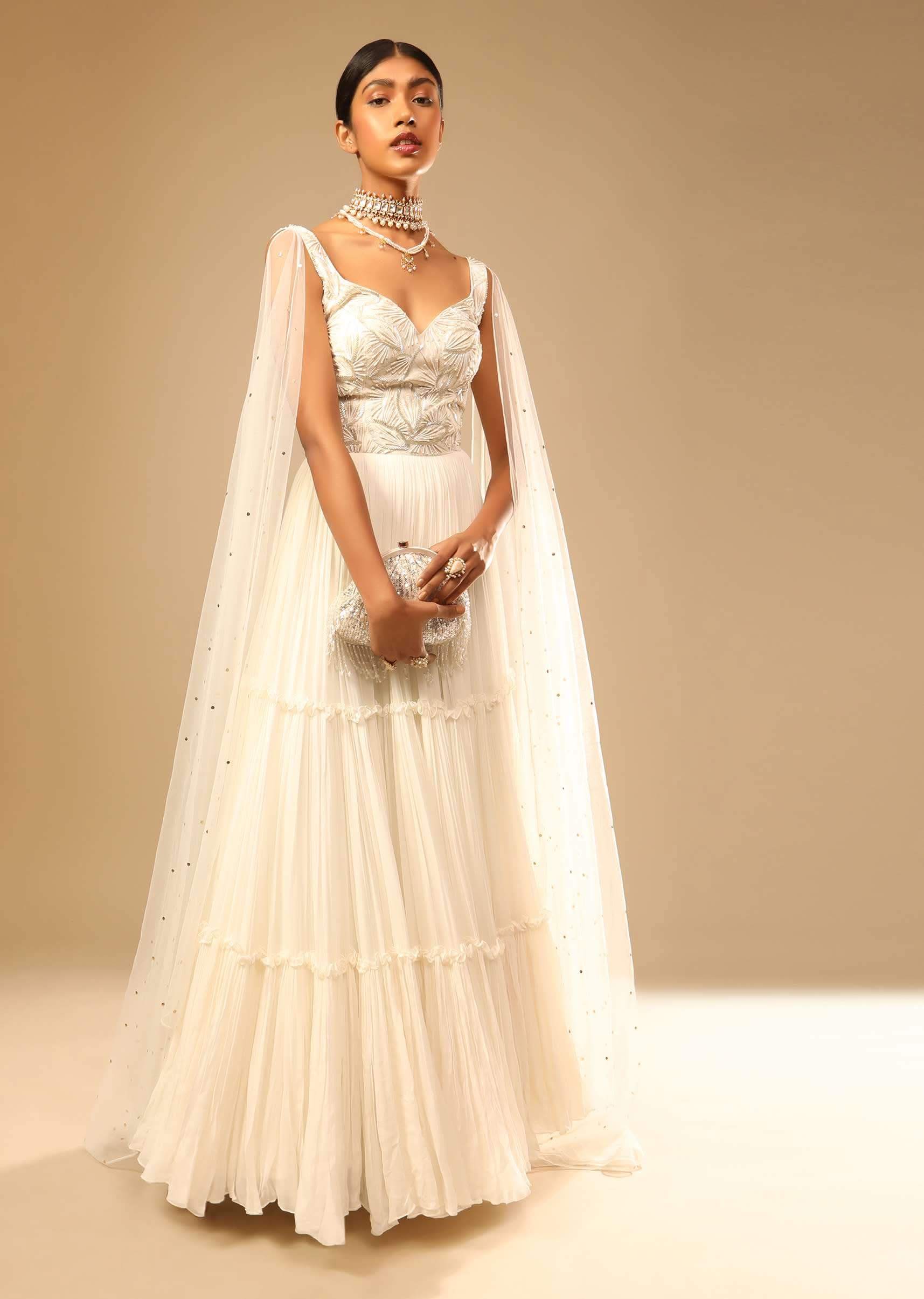 Off White Gown In Georgette With Tiered Flare And Hand Embroidered Leaf Motifs On The Bodice - Image 5
