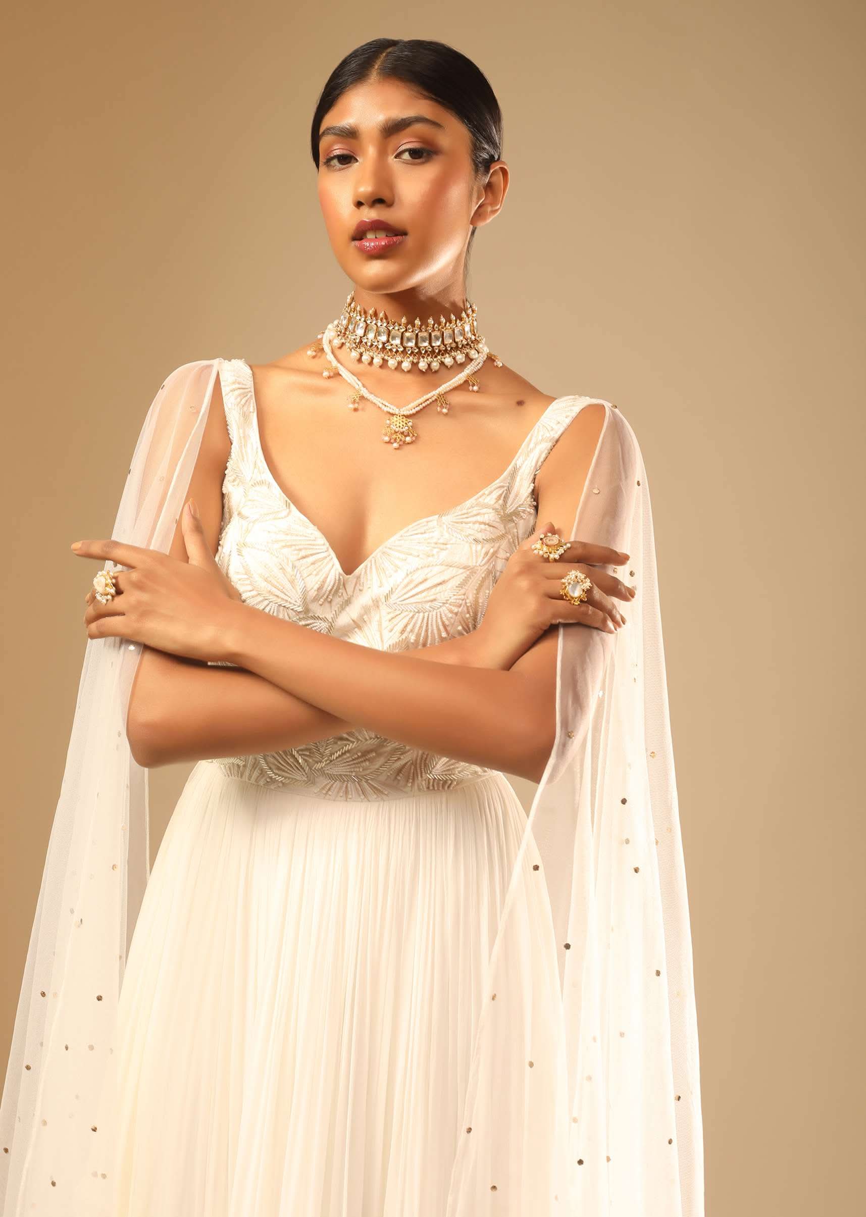Off White Gown In Georgette With Tiered Flare And Hand Embroidered Leaf Motifs On The Bodice - Image 6