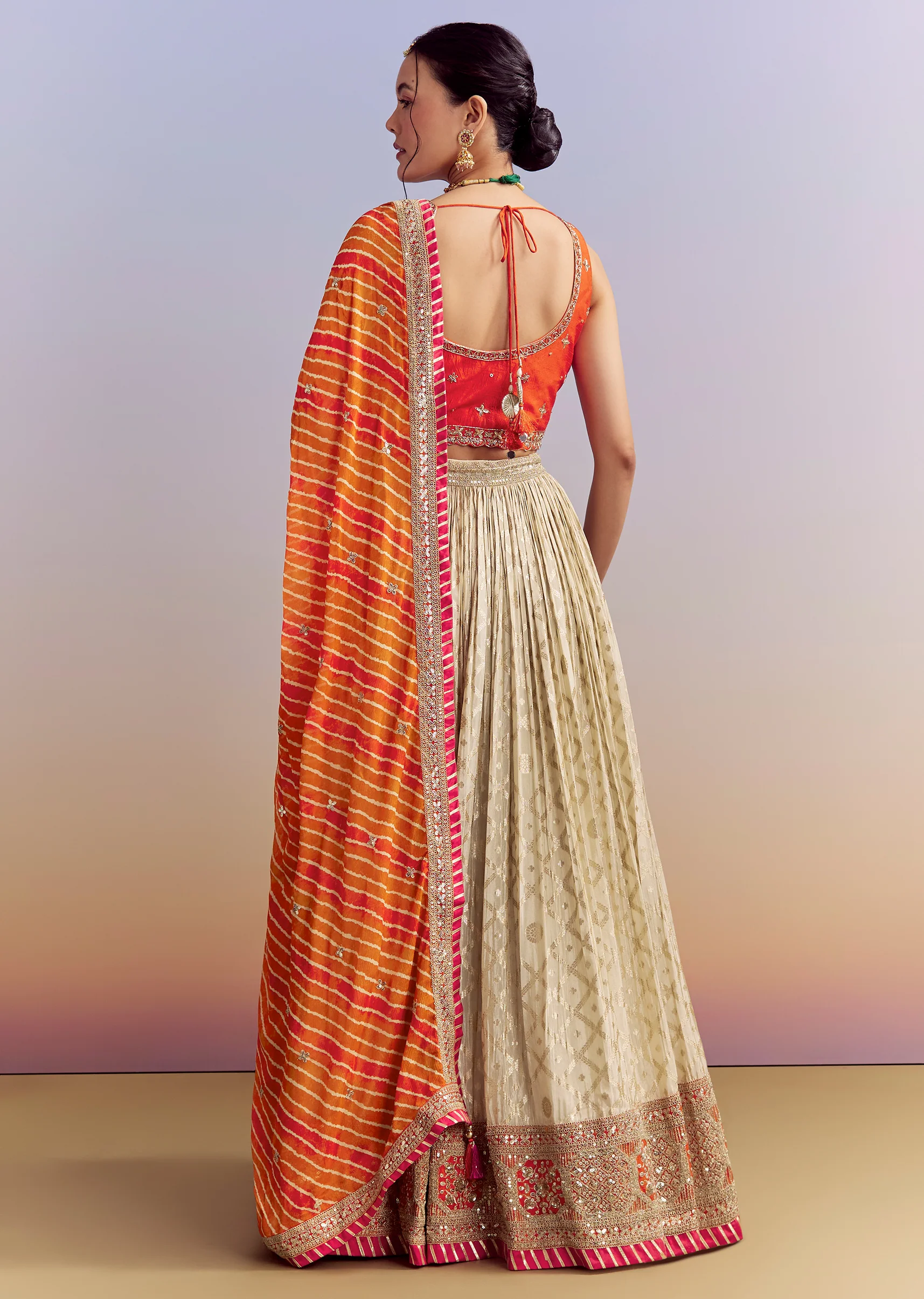 Orange Brocade Silk Bridesmaid Lehenga With Leheriya Dupatta - Image 2