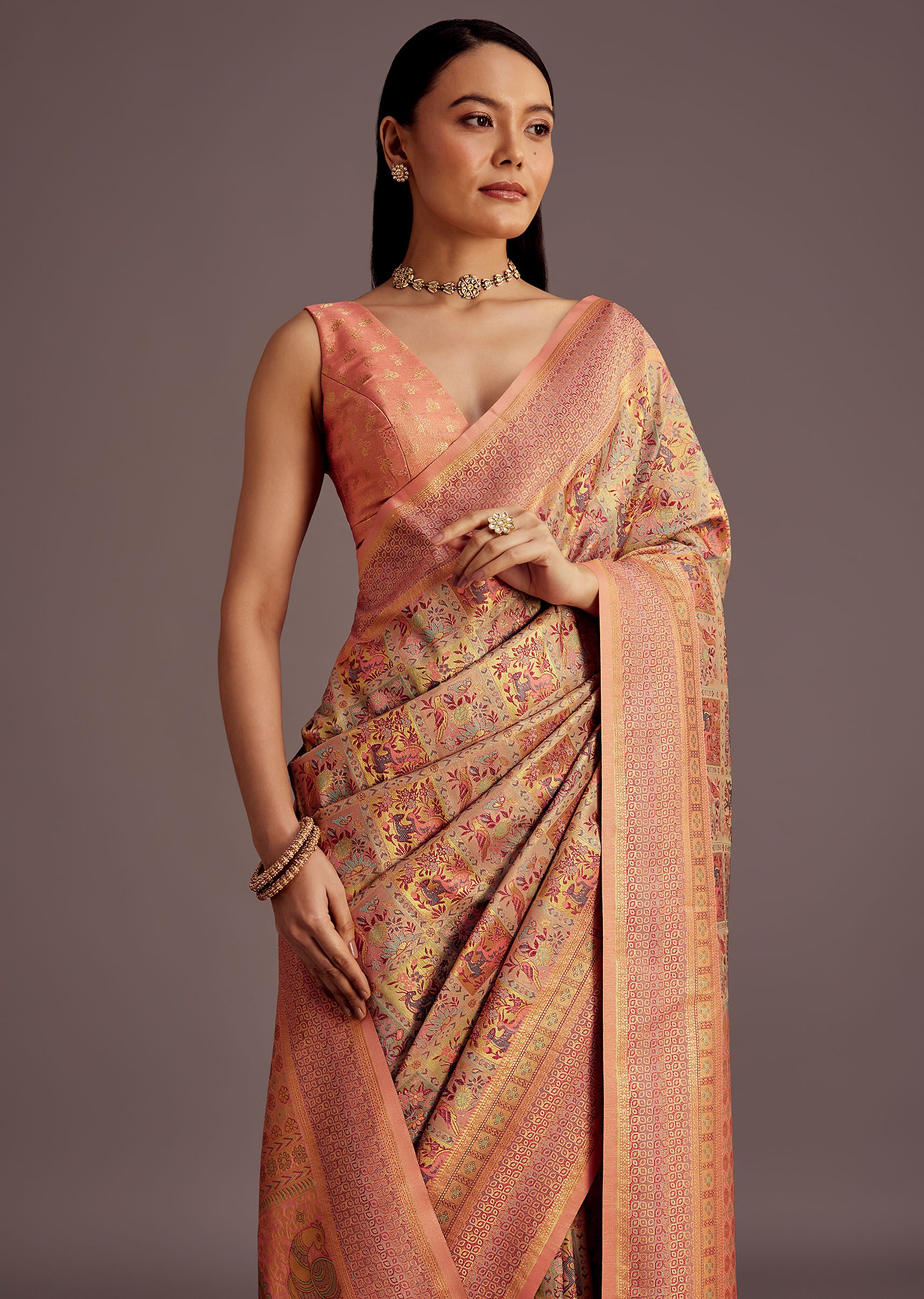 Pastel Orange Silk Saree With Woven Work
