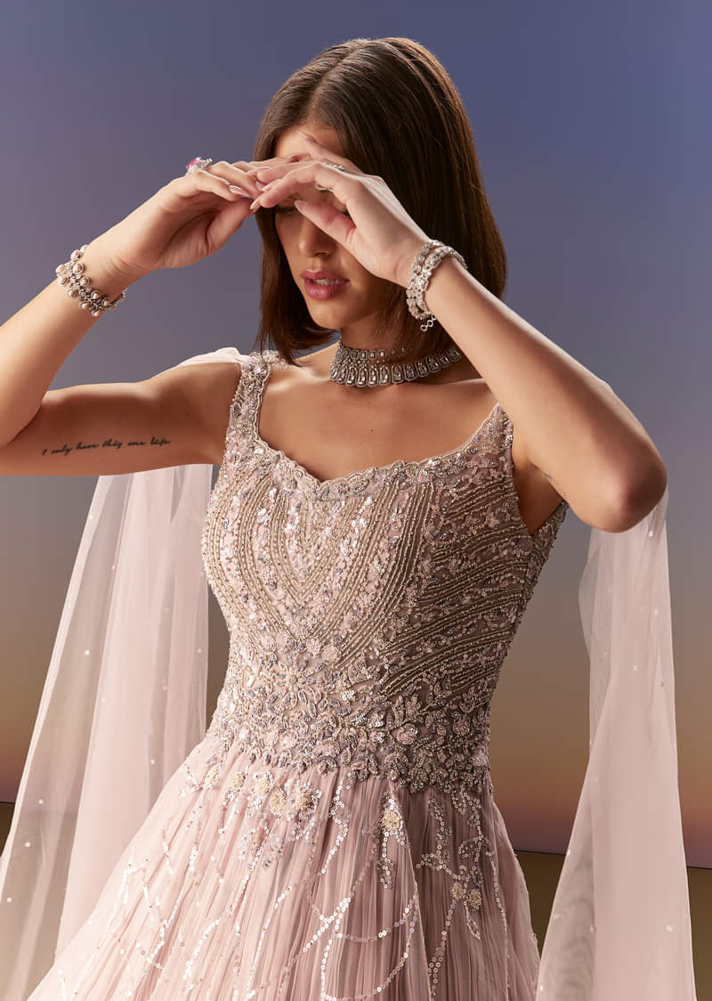 Pastel Pink Gown With Sheer Cape Drape And Heavy Embroidery - Image 3