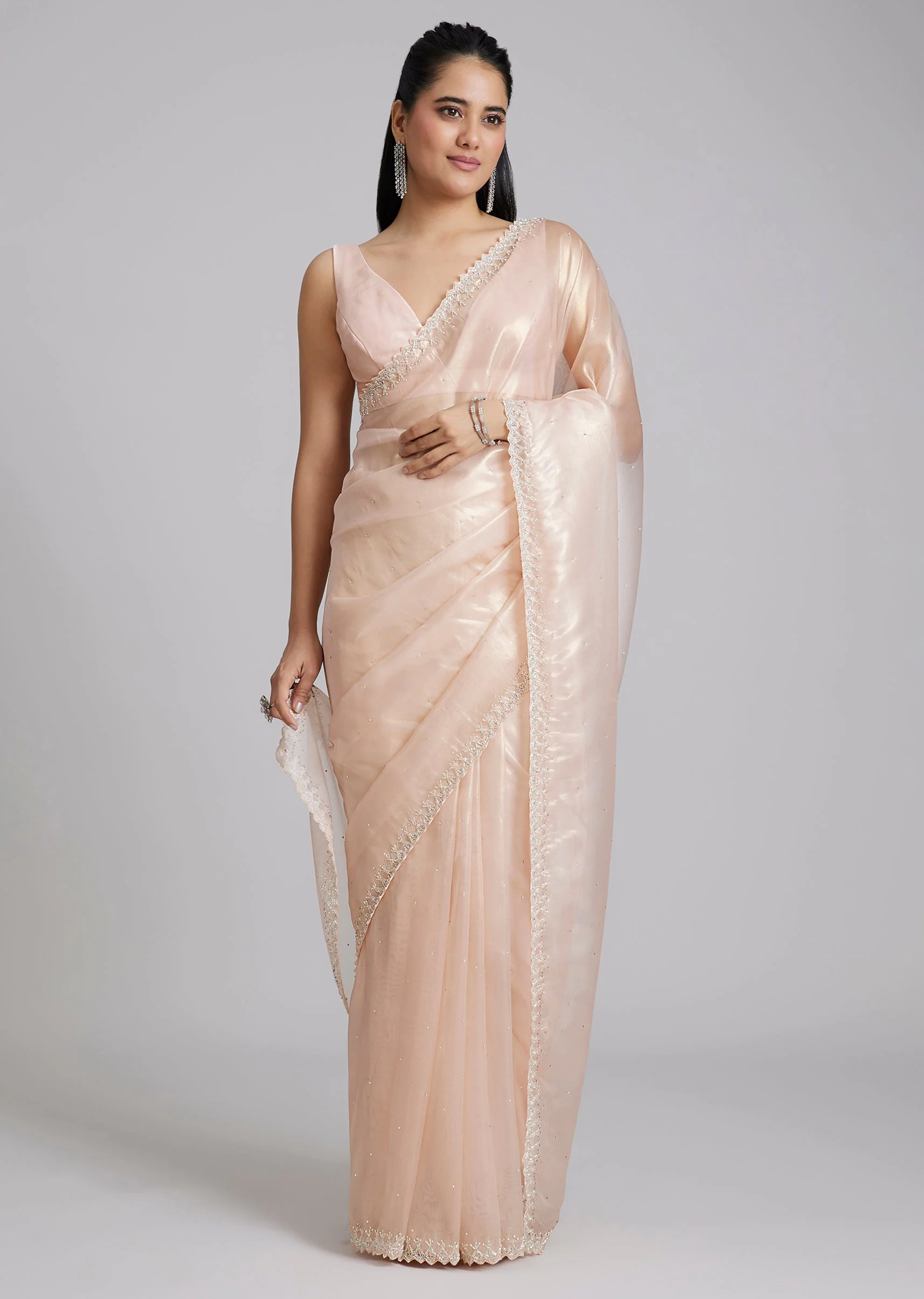 Peach Tissue Saree With Stones And Zigzag Border