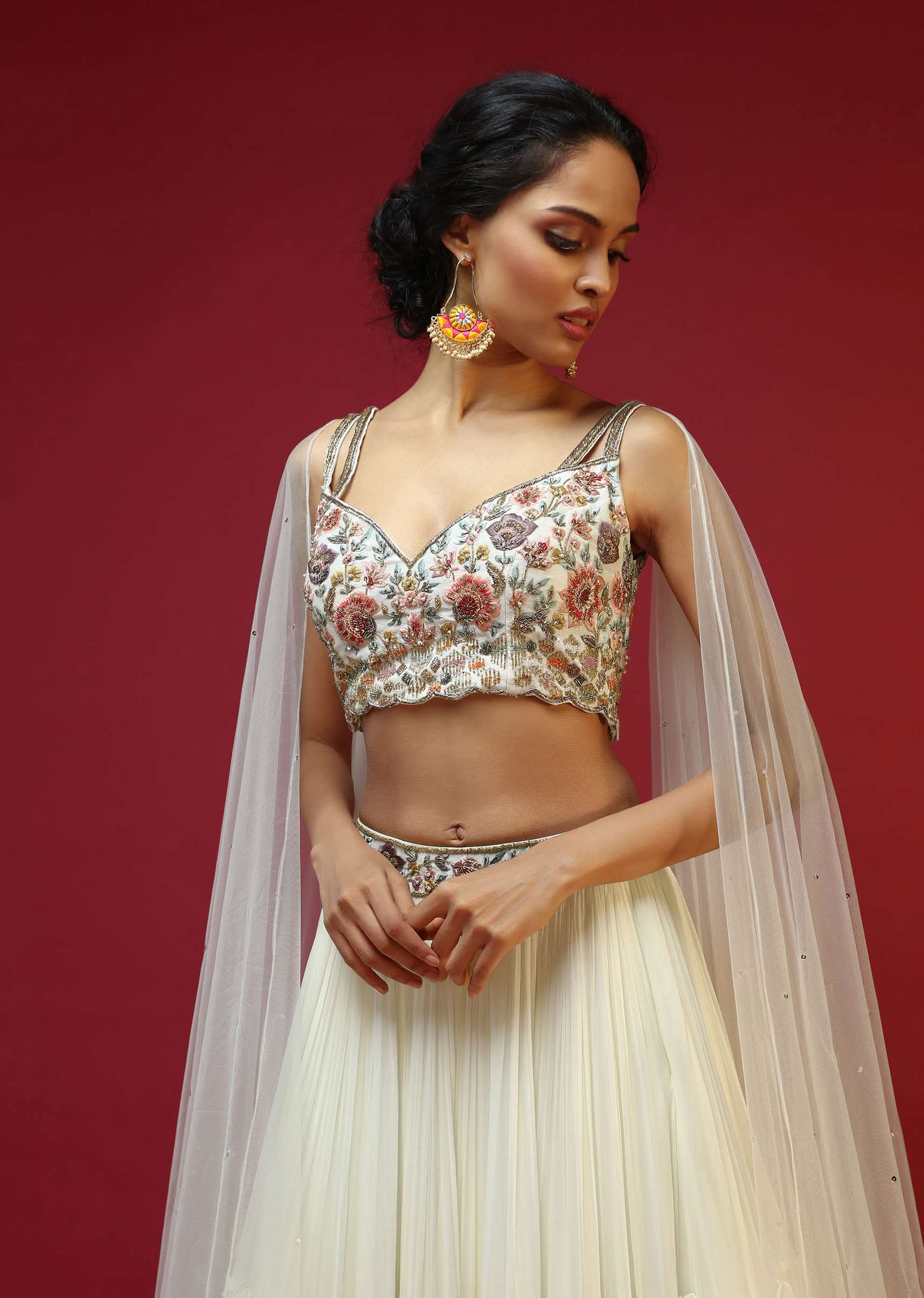 Powder White Lehenga Choli With Attached Cape And Hand Embroidery Using Colorful Resham And Sequins In Floral Motifs - Image 2