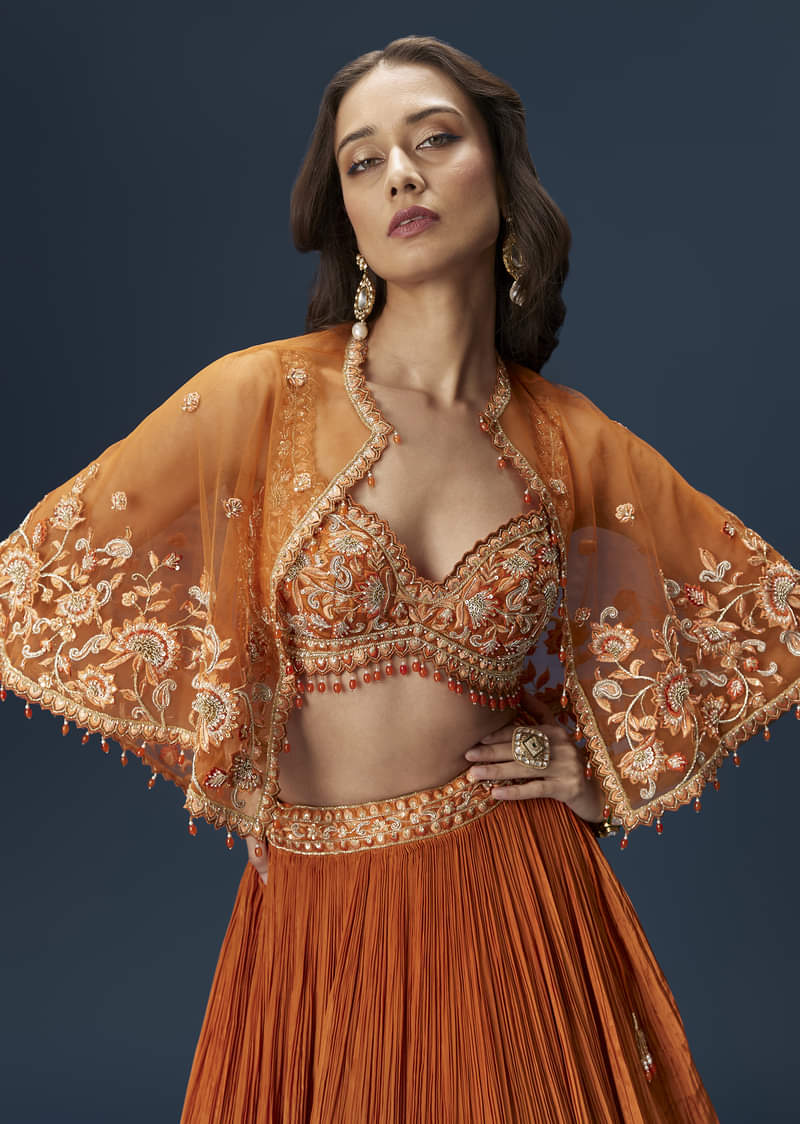 Rust Orange Embroidered Lehenga With Dramatic Cape And Blouse - Image 4