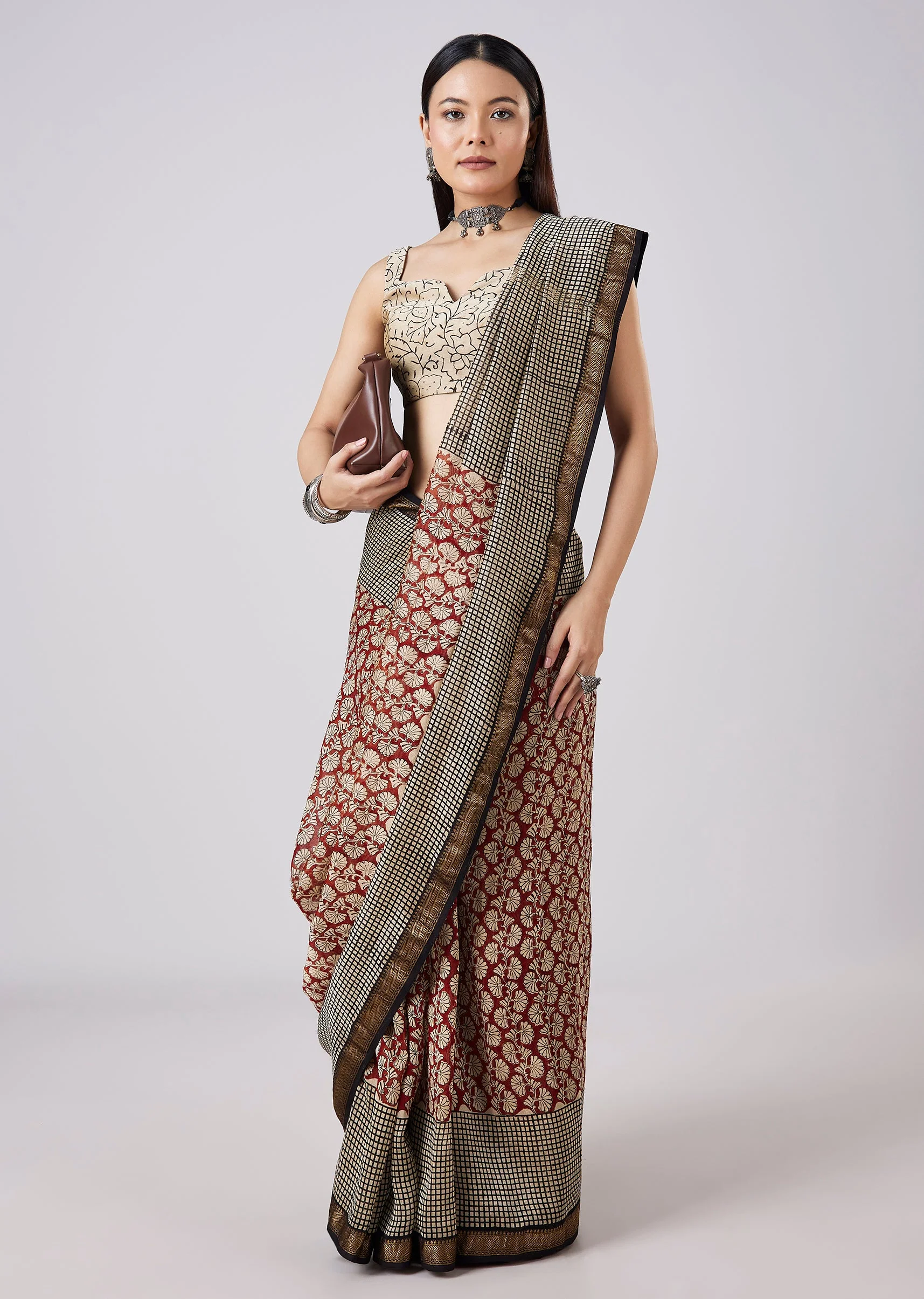 Rust Saree with Hand Painted Motifs and Stitched Blouse