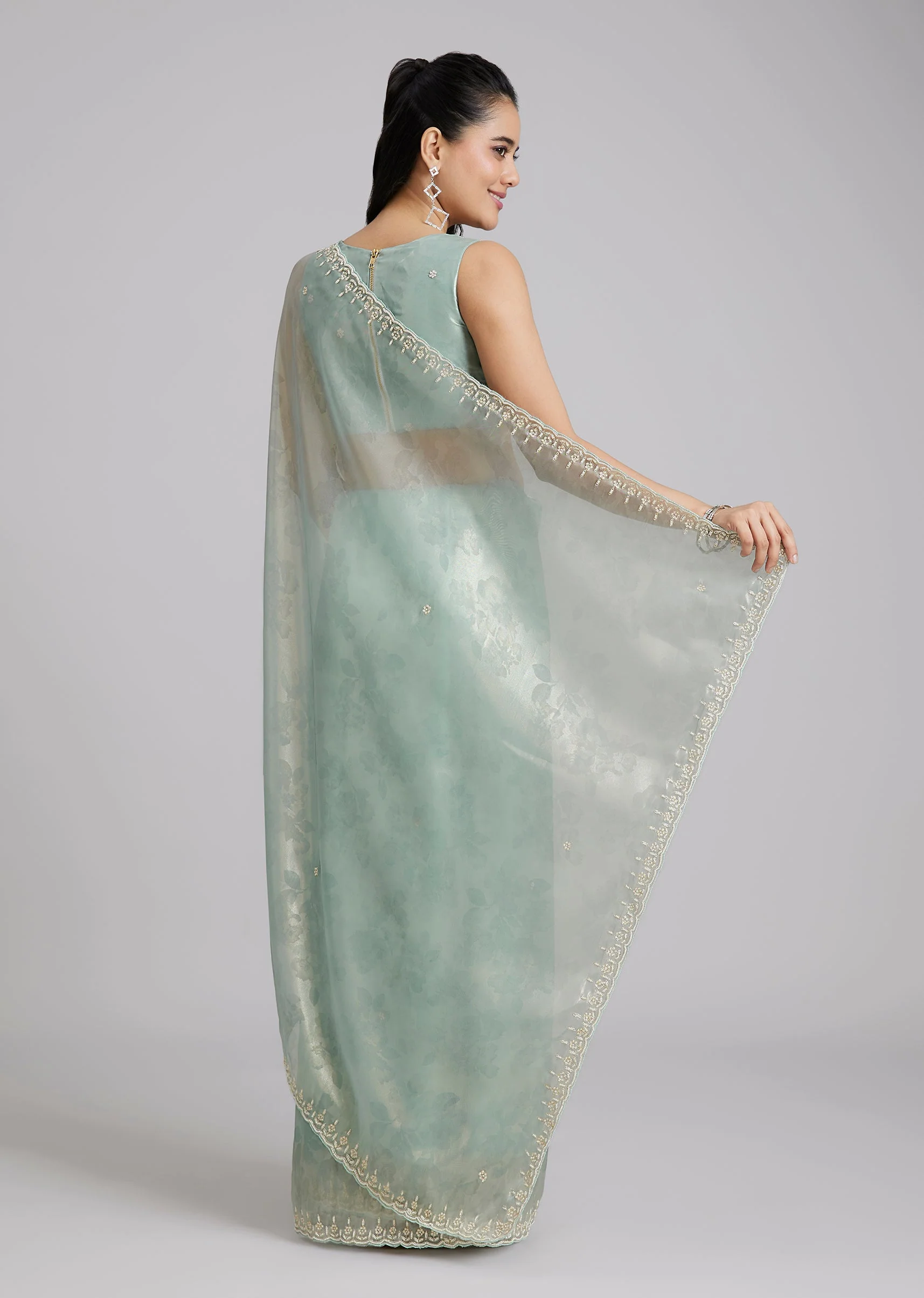 Sky Blue Tissue Saree With Floral Border And Buttis - Image 4