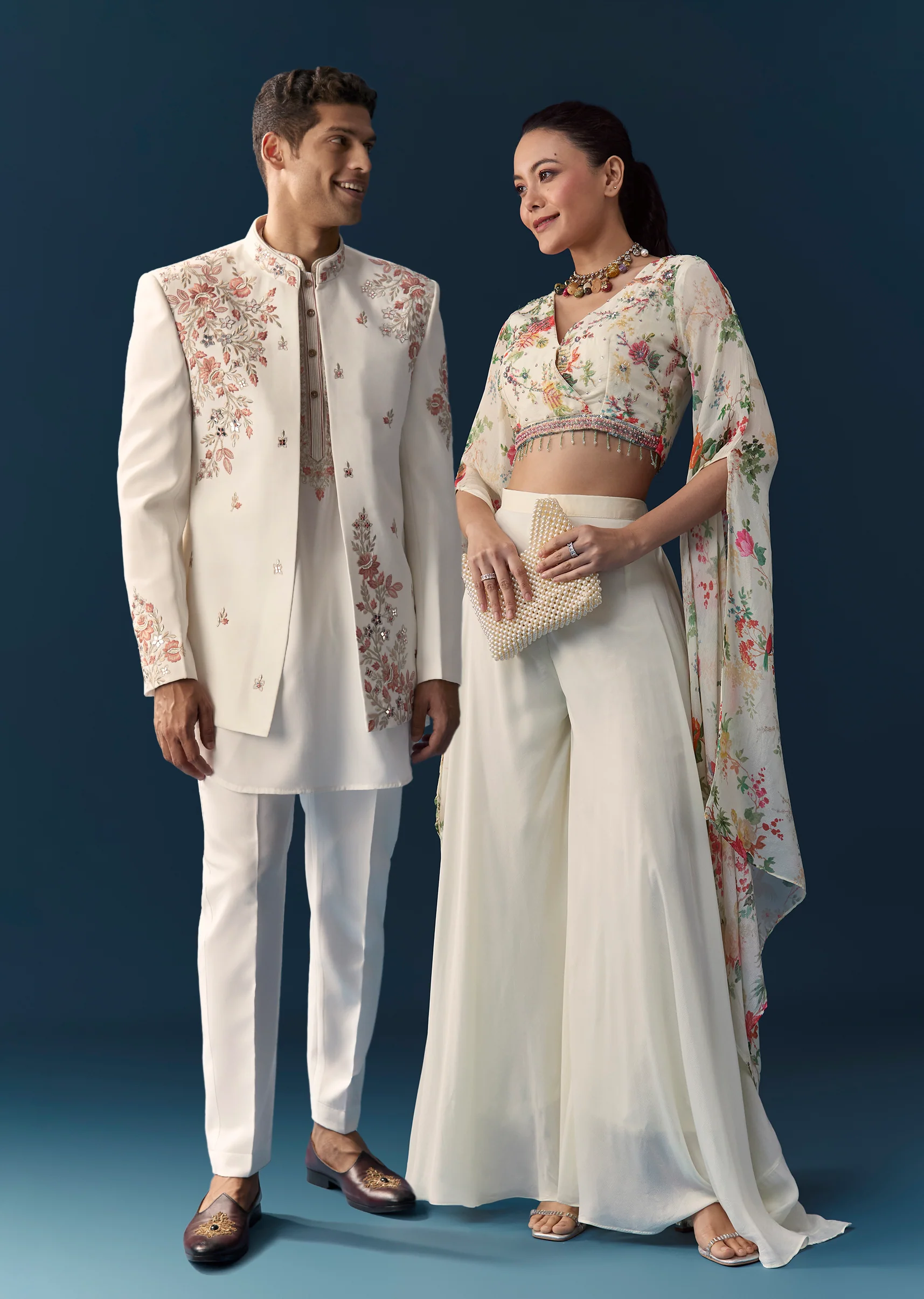 Soft Coordinated Couple Set – Off-White Floral Crop Top Palazzo Set With Cutdana For Her And Off-White Indo-Western Set With Hand Embroidery For Him