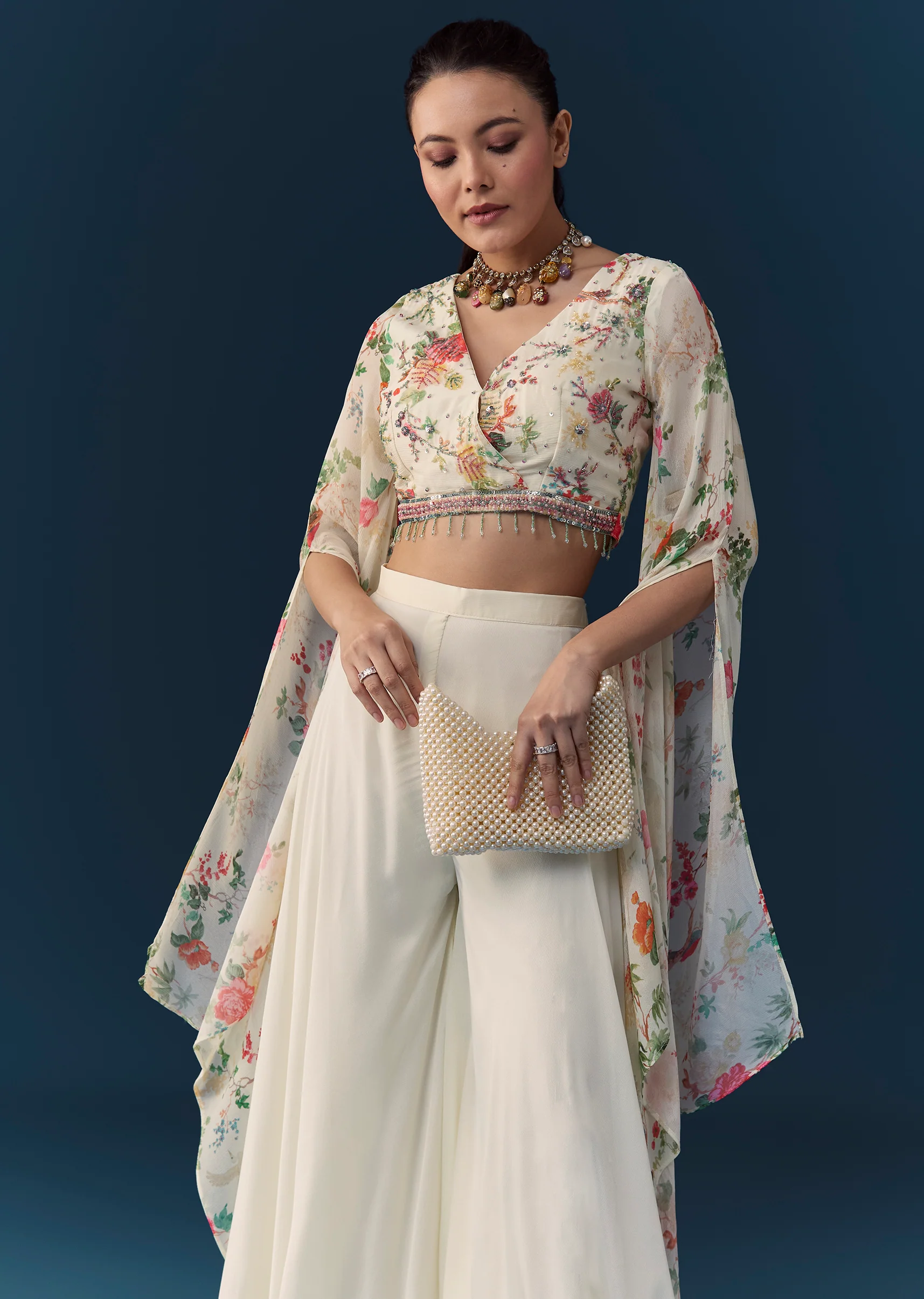 Soft Coordinated Couple Set – Off-White Floral Crop Top Palazzo Set With Cutdana For Her And Off-White Indo-Western Set With Hand Embroidery For Him - Image 4