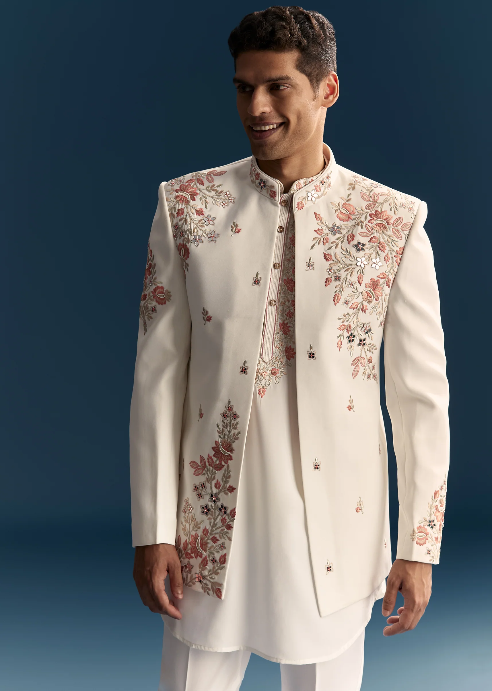 Soft Coordinated Couple Set – Off-White Floral Crop Top Palazzo Set With Cutdana For Her And Off-White Indo-Western Set With Hand Embroidery For Him - Image 9