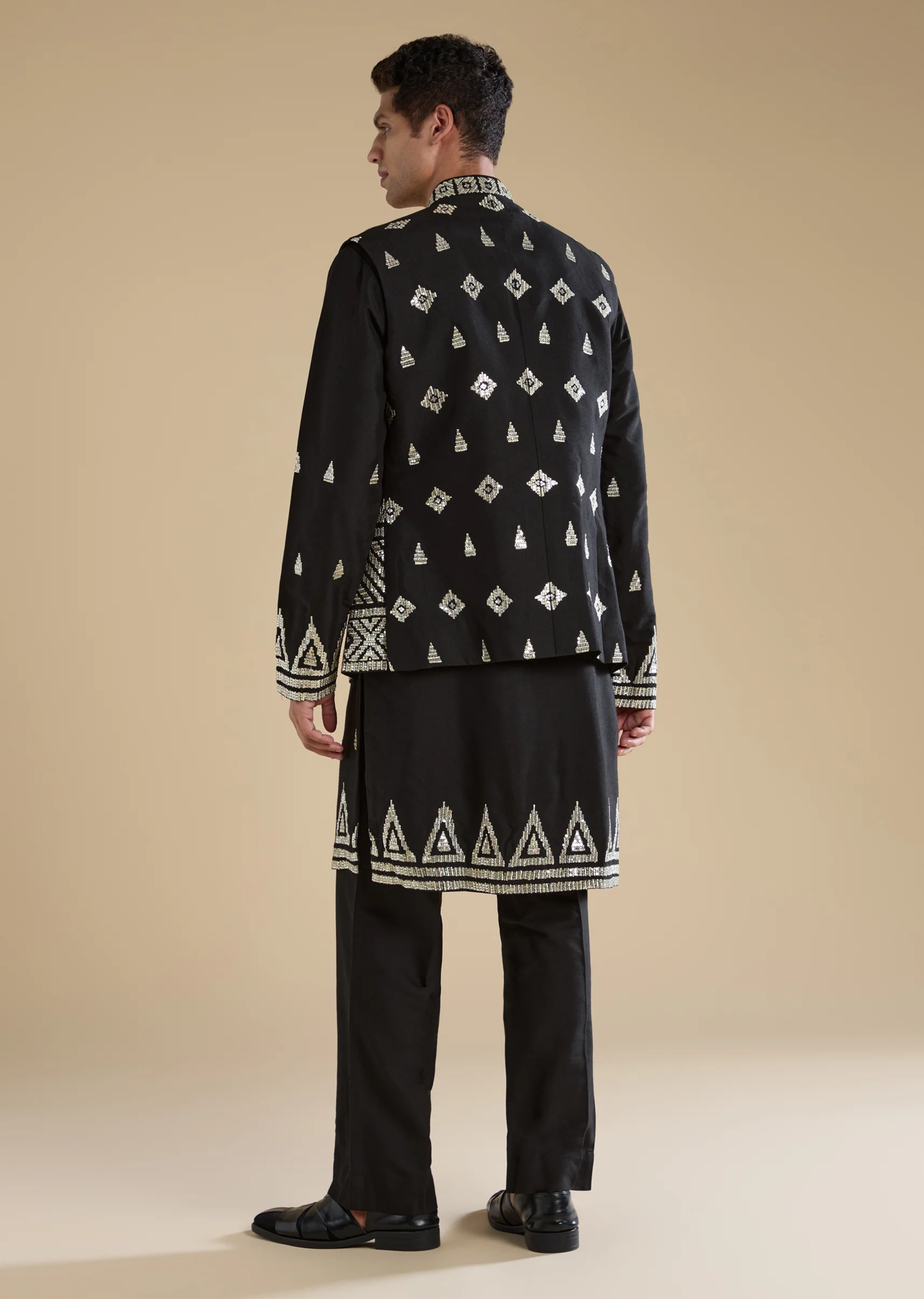 Statement Black Modern Couple Set – Black Chinon Crop Top Skirt Set For Her And Black Foil Applique Jacket Kurta Set For Him - Image 7