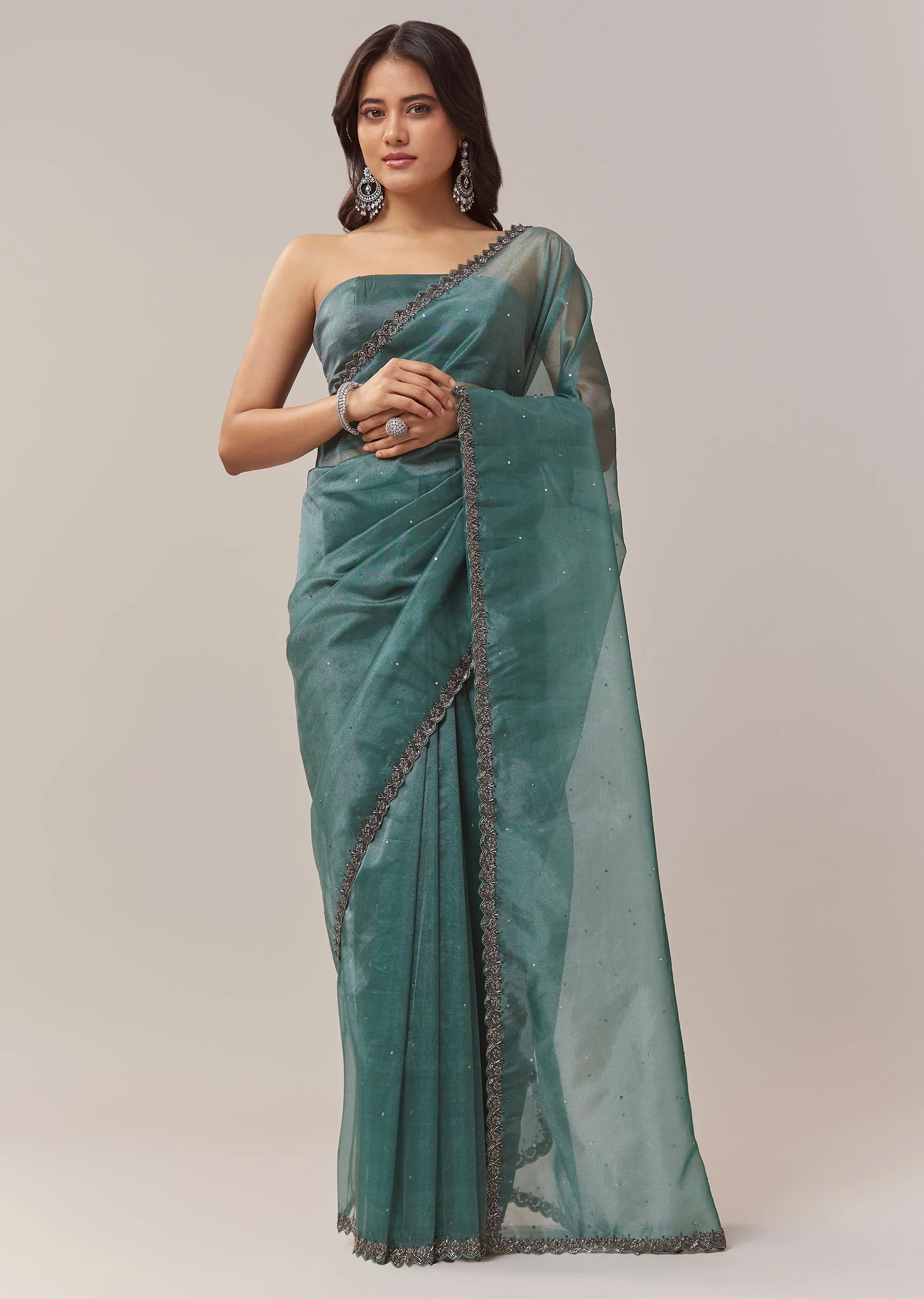 Teal Blue Net Saree With Zigzag Cutwork Border And Sequin Embroidery