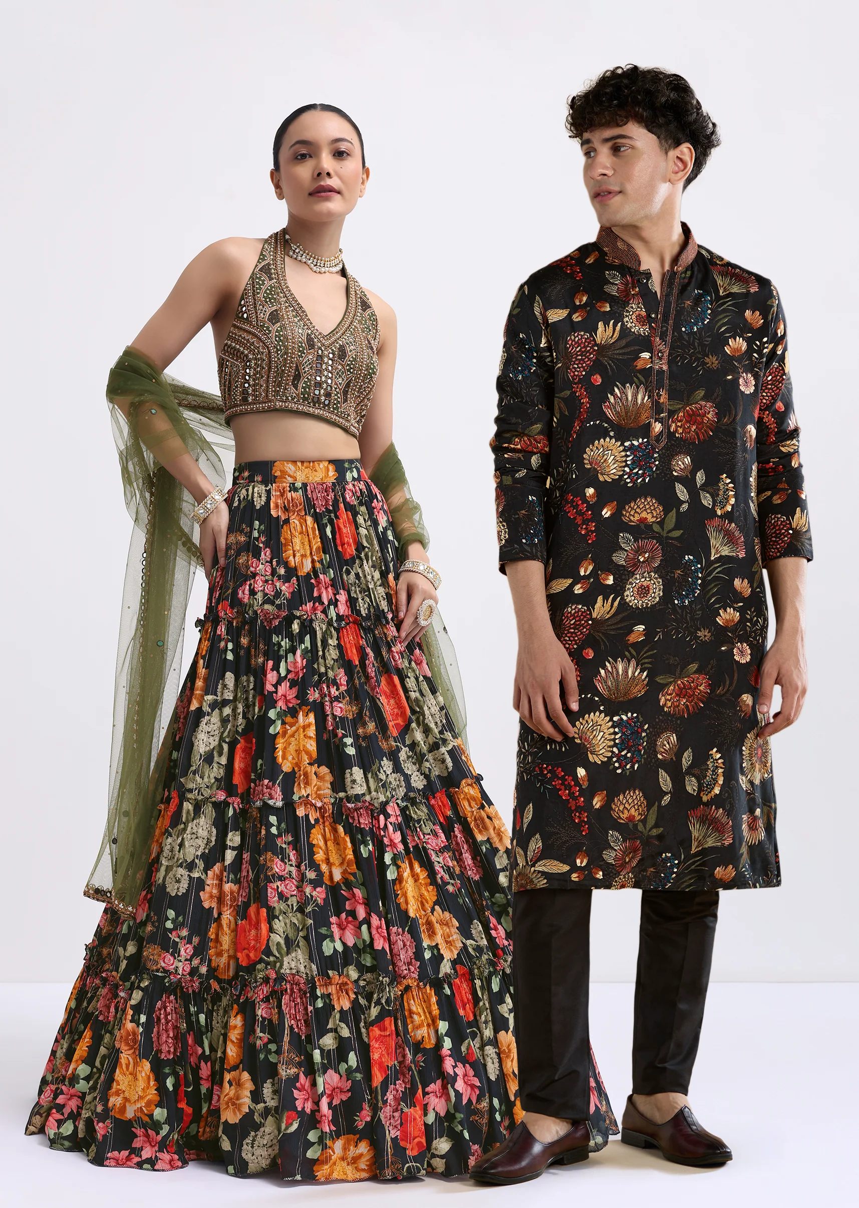 Timeless Floral Couple Set – Black Floral Printed Silk Lehenga Choli For Her And Black Silk Kurta Set With Resham Embroidery For Him