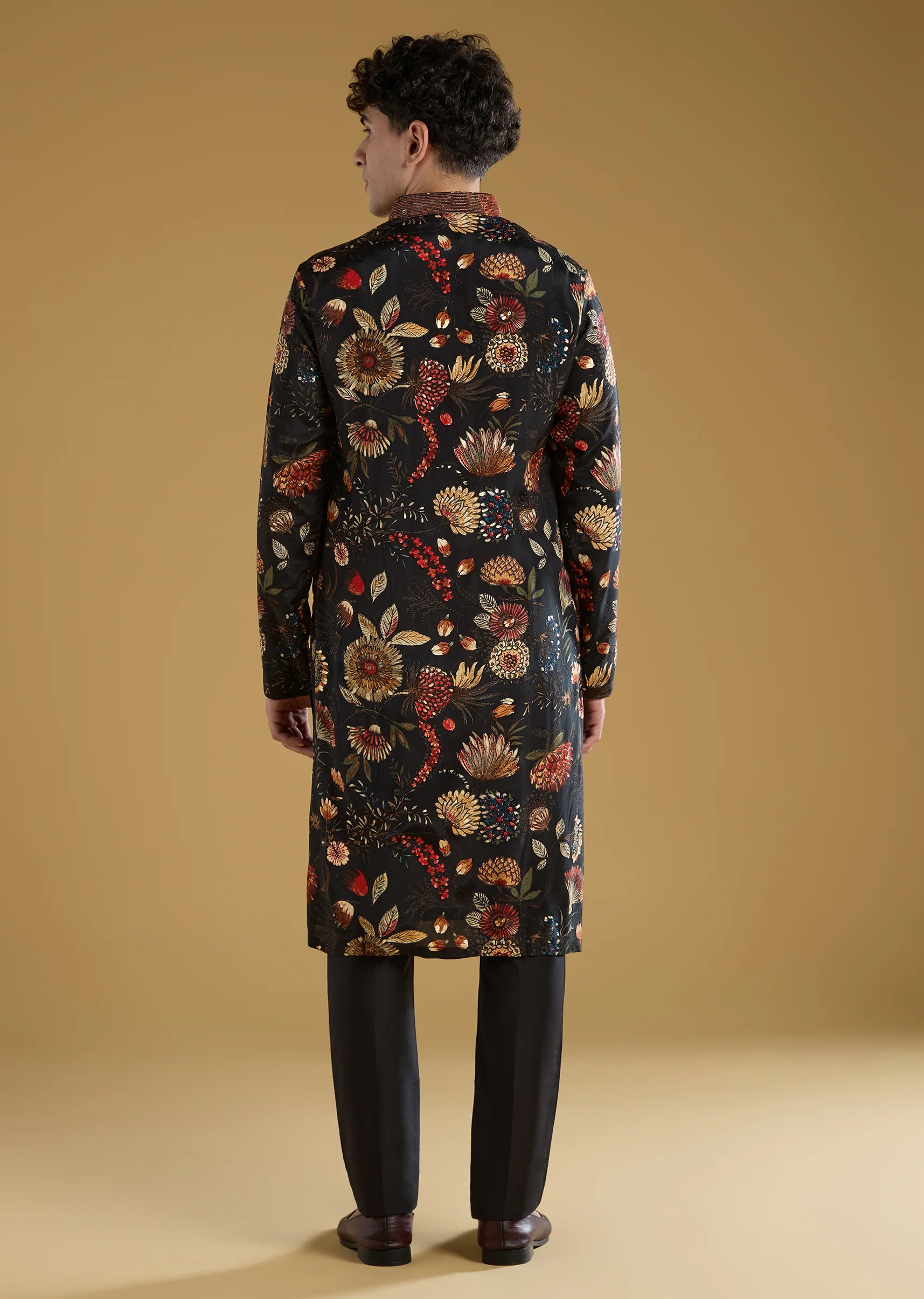 Timeless Floral Couple Set – Black Floral Printed Silk Lehenga Choli For Her And Black Silk Kurta Set With Resham Embroidery For Him - Image 9