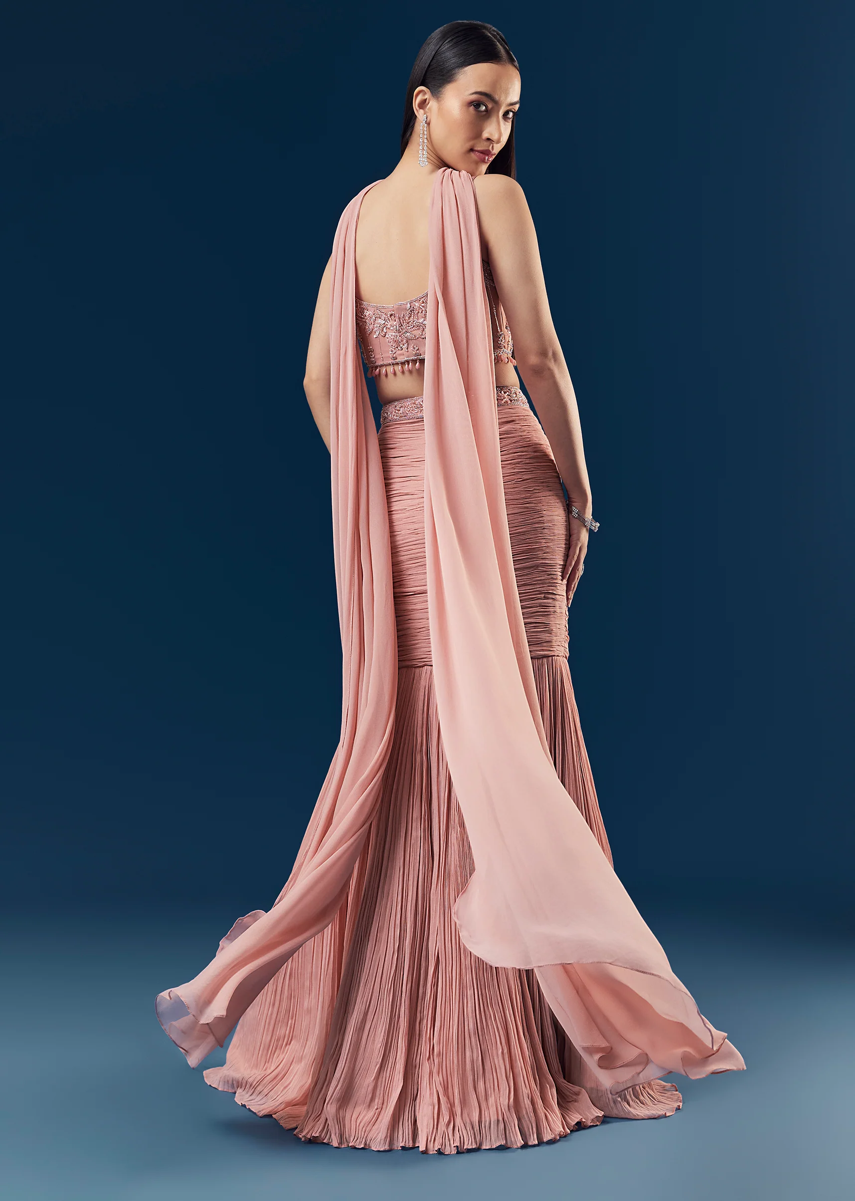Velvet And Pastel Glamour Couple Set – Blush Pink Fish Cut Lehenga for Her And Blue Velvet Jodhpuri Set for Him - Image 4