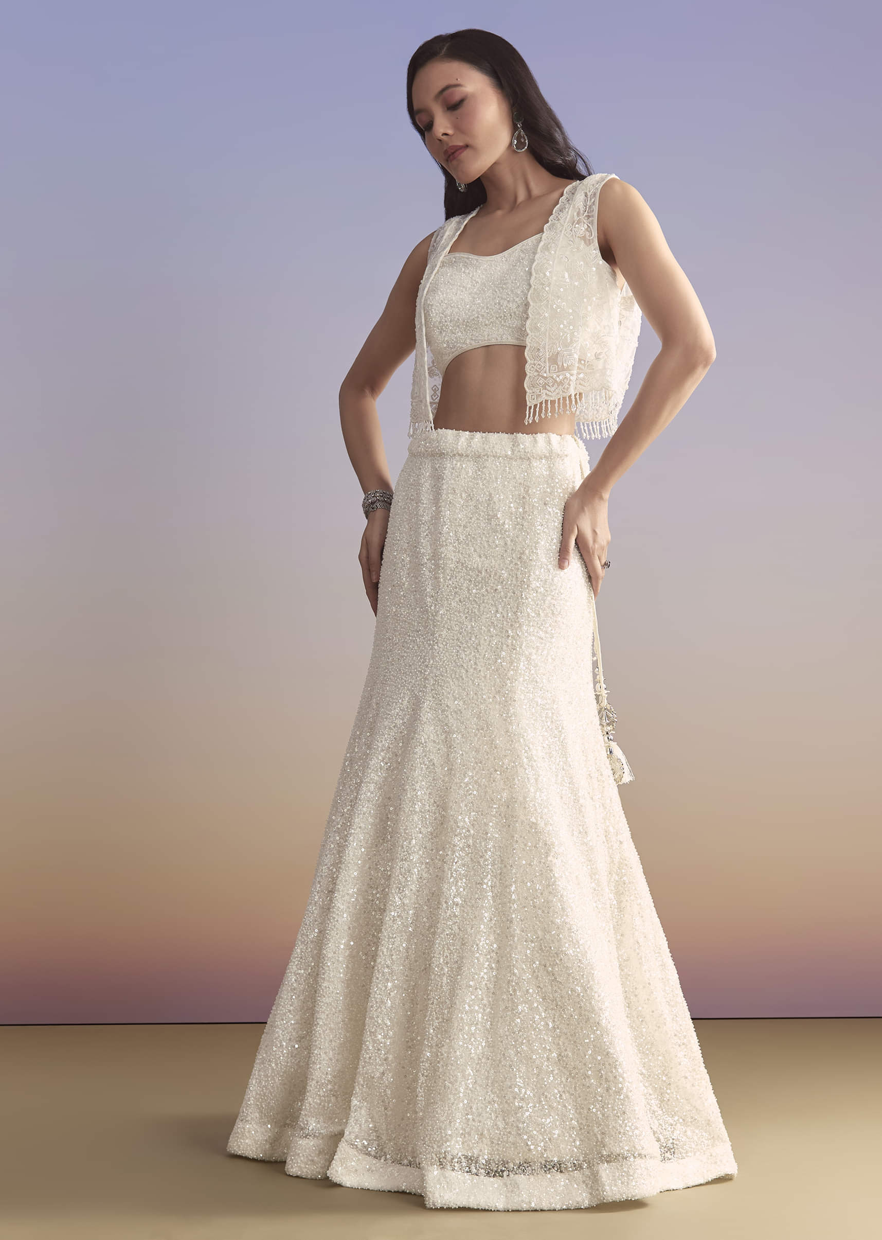 White Net Bridesmaid Lehenga With Sequins Work And Embellished Jacket - Image 4