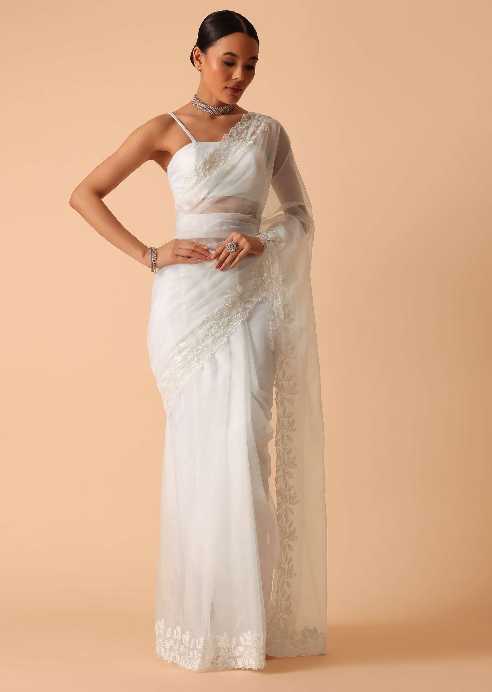 White Saree In Organza With Floral Motif Border And Unstitched Blouse Piece - Image 3