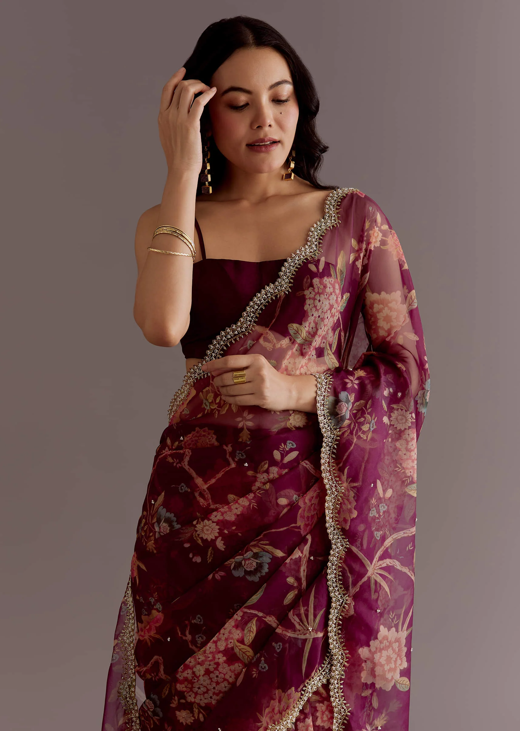 Wine Organza Saree With Floral Print And Hand Embellished Border